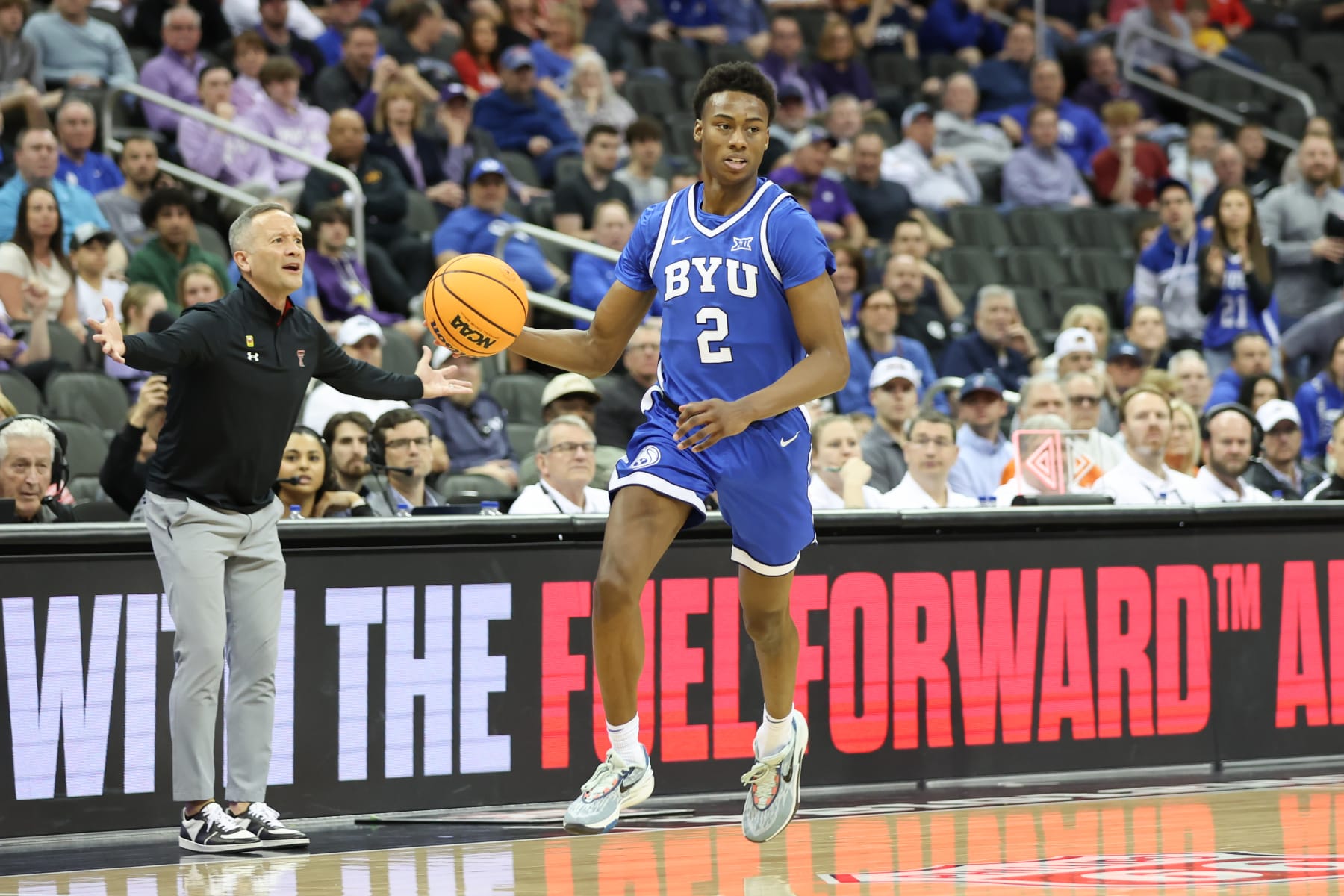 KANSAS CITY, MO - MARCH 14: Brigham Young Cougars guard Jaxson Robinson (2) brings the ball up court in the first half of a Big 12 tournament quarterfinal game between the Brigham Young Cougars and Texas Tech Red Raiders on Mar 14, 2024 at T-Mobile Center in Kansas City, MO. (Photo by Scott Winters/Icon Sportswire via Getty Images)