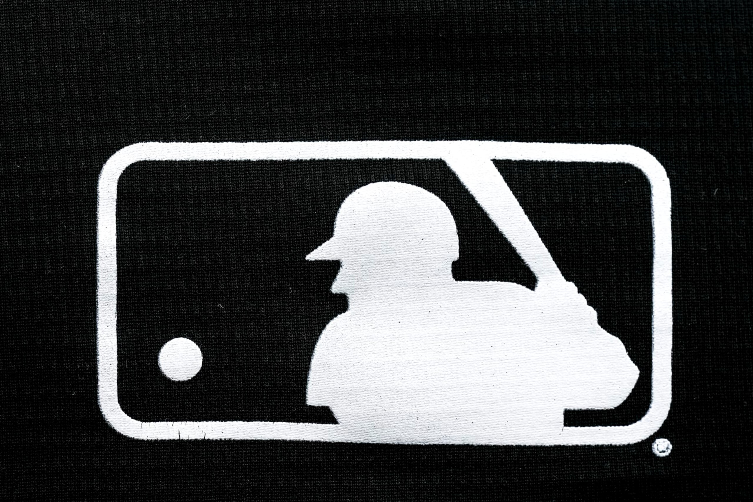 DETROIT, MICHIGAN - APRIL 28: A detail of the MLB Major League Baseball logo on an article of clothing during the game between the Detroit Tigers and Kansas City Royals at Comerica Park on April 28, 2024 in Detroit, Michigan. (Photo by Nic Antaya/Getty Images)