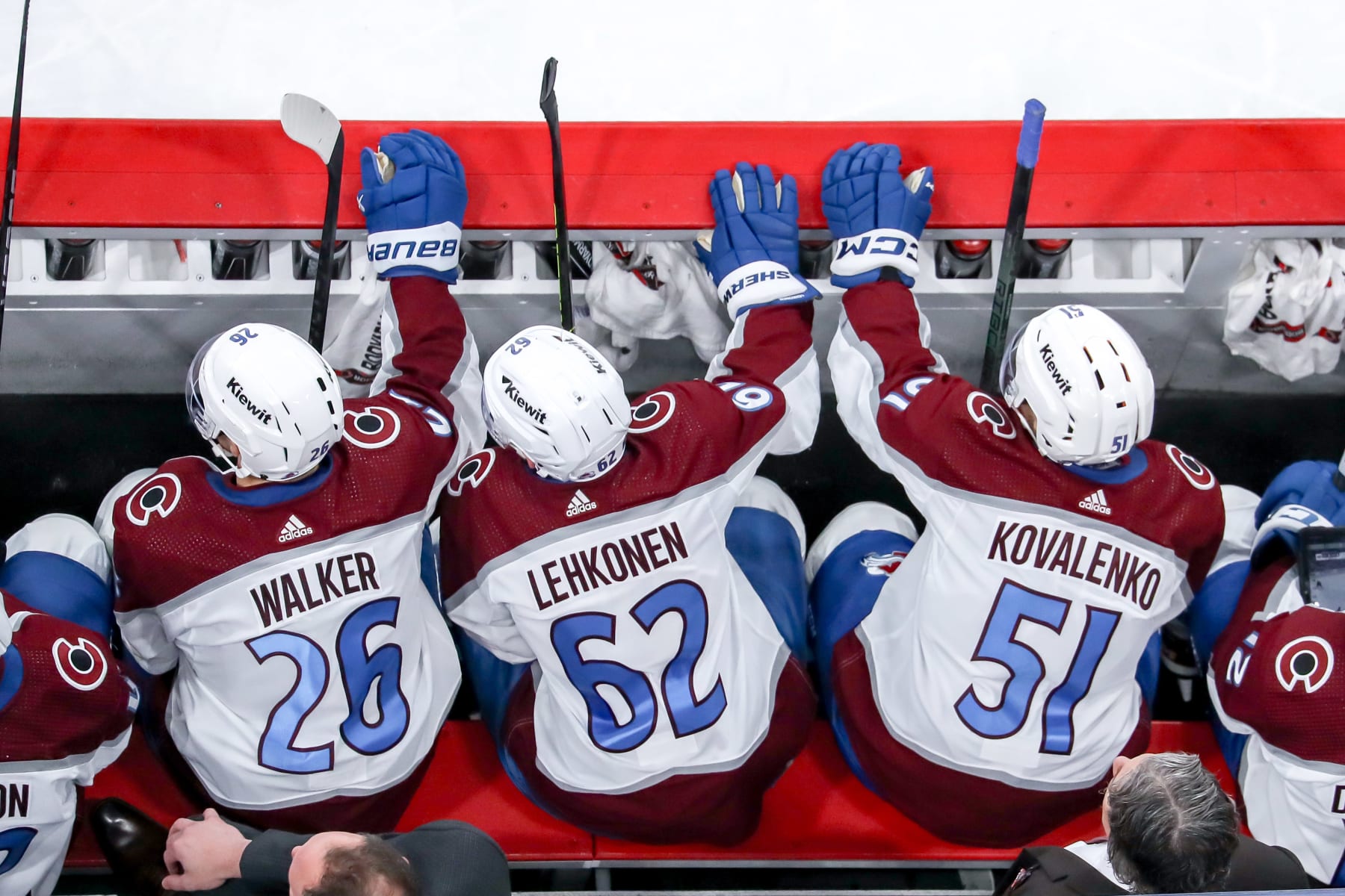 WINNIPEG, CANADA - APRIL 30: Sean Walker #26, Artturi Lehkonen #62 and Nikolai Kovalenko #51 of the Colorado Avalanche look on from the bench during second period action against the Winnipeg Jets in Game Five of the First Round of the 2024 Stanley Cup Playoffs at the Canada Life Centre on April 30, 2024 in Winnipeg, Manitoba, Canada. The Avs defeated the Jets 6-3 and win the series 4-1. (Photo by Darcy Finley/NHLI via Getty Images) WINNIPEG, CANADA - APRIL 30: Sean Walker #26, Artturi Lehkonen #62 and Nikolai Kovalenko #51 of the Colorado Avalanche look on from the bench during second period action against the Winnipeg Jets in Game Five of the First Round of the 2024 Stanley Cup Playoffs at the Canada Life Centre on April 30, 2024 in Winnipeg, Manitoba, Canada. The Avs defeated the Jets 6-3 and win the series 4-1. (Photo by Darcy Finley/NHLI via Getty Images)