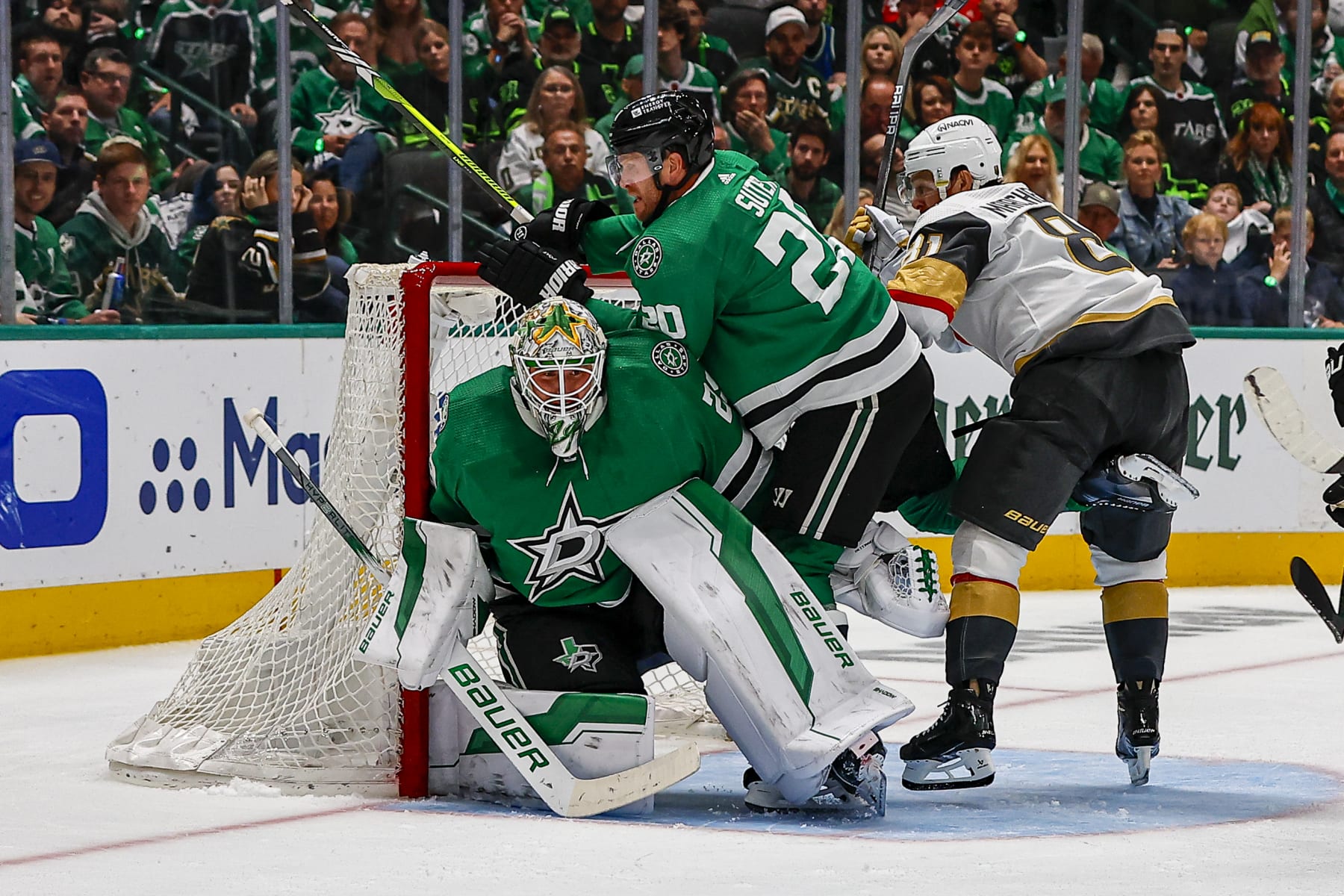 DALLAS, TX - MAY 05: Dallas Stars defenseman Ryan Suter (20) and Vegas Golden Knights right wing Jonathan Marchessault (81) crash into Dallas Stars goaltender Jake Oettinger (29) during game seven of the Western Conference First Round between the Dallas Stars and the Vegas Golden Knights on May 5, 2024 at American Airlines Center in Dallas, Texas. (Photo by Matthew Pearce/Icon Sportswire via Getty Images) DALLAS, TX - MAY 05: Dallas Stars defenseman Ryan Suter (20) and Vegas Golden Knights right wing Jonathan Marchessault (81) crash into Dallas Stars goaltender Jake Oettinger (29) during game seven of the Western Conference First Round between the Dallas Stars and the Vegas Golden Knights on May 5, 2024 at American Airlines Center in Dallas, Texas. (Photo by Matthew Pearce/Icon Sportswire via Getty Images)