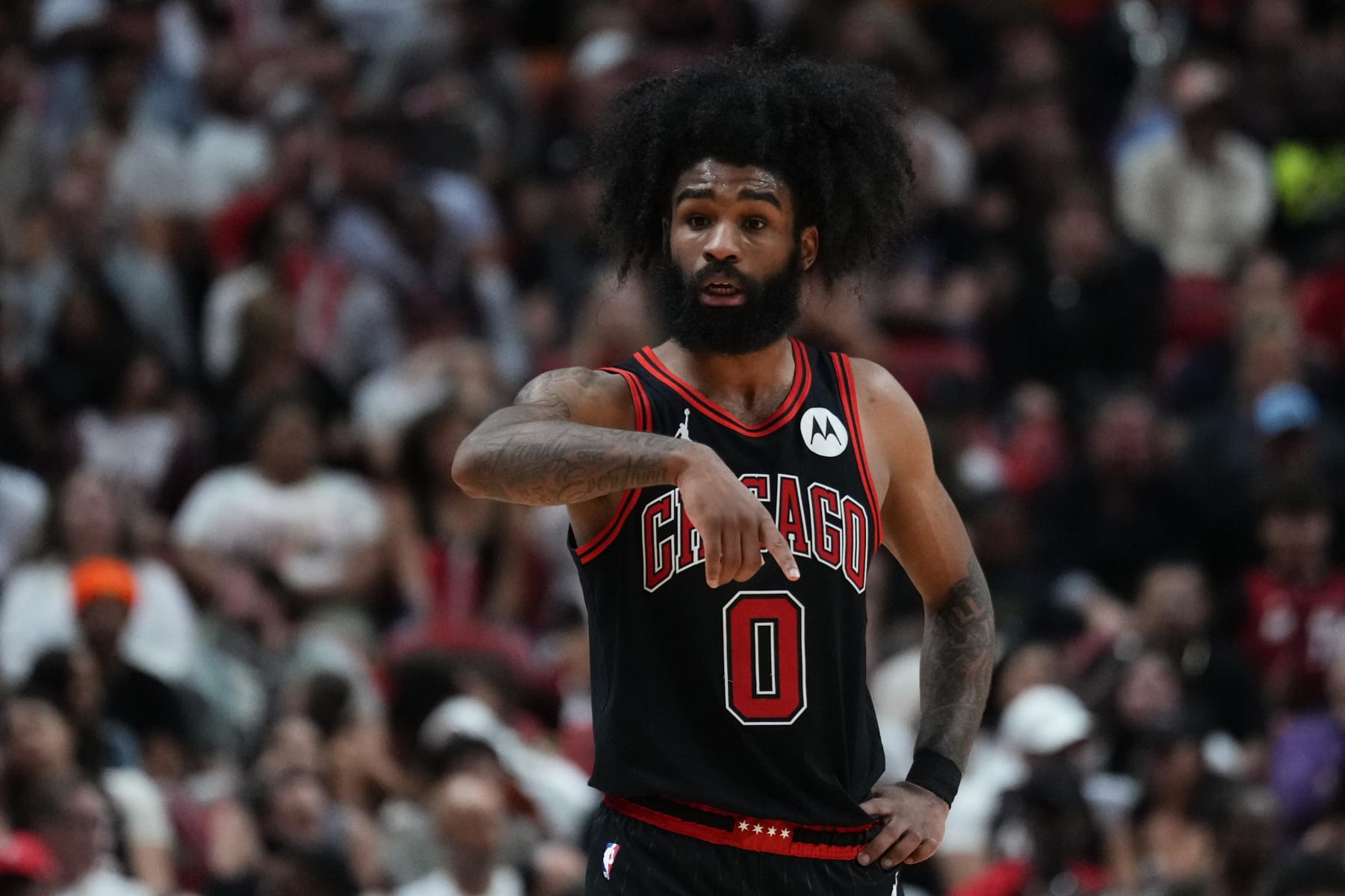 MIAMI, FLORIDA - APRIL 19: Coby White #0 of the Chicago Bulls looks on against the Miami Heat in the third quarter during the Play-In Tournament at Kaseya Center on April 19, 2024 in Miami, Florida. NOTE TO USER: User expressly acknowledges and agrees that, by downloading and or using this photograph, User is consenting to the terms and conditions of the Getty Images License Agreement. (Photo by Rich Storry/Getty Images)