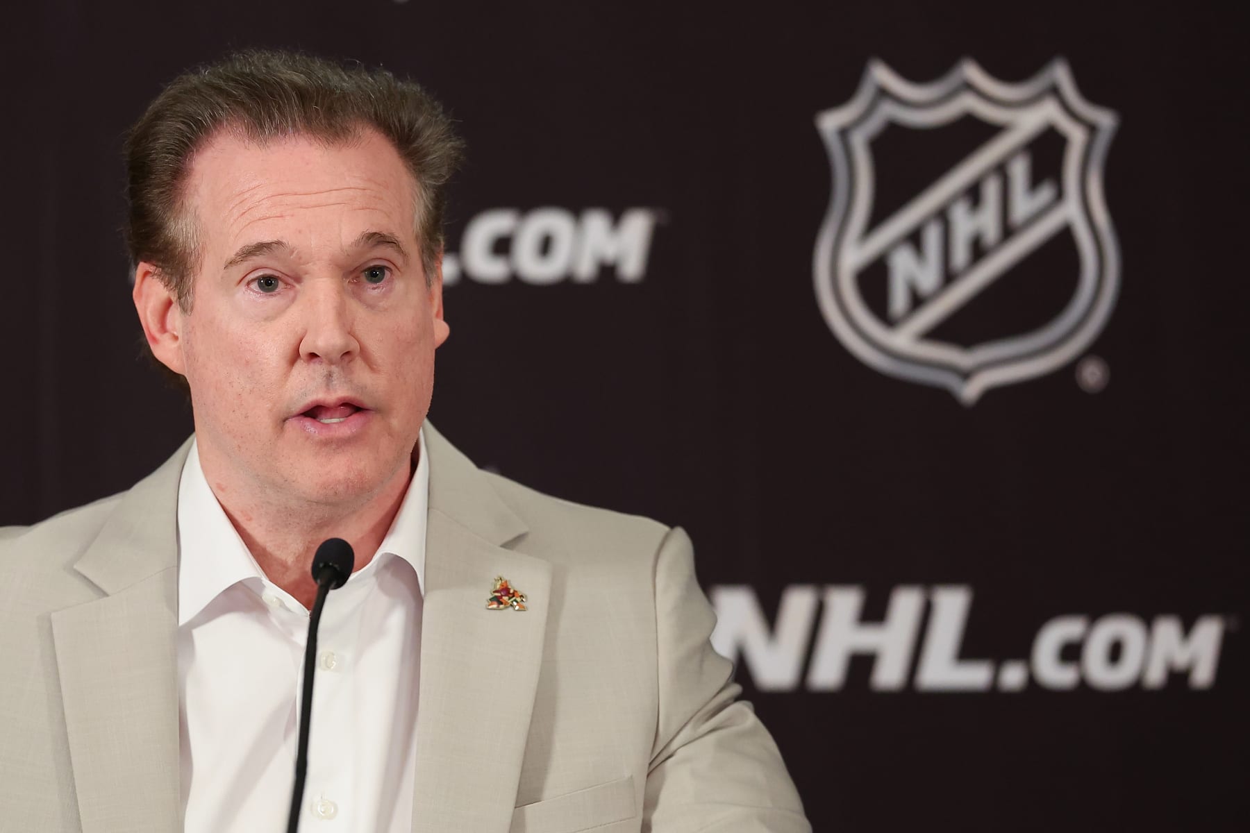 PHOENIX, ARIZONA - APRIL 19: Coyotes Chairman and Governor Alex Meruelo speaks during a press conference at Hyatt Regency Phoenix on April 19, 2024 in Phoenix, Arizona.  The NHL unanimously approved a $1.2 billion sale from Alex Meruelo to Utah Jazz owners Ryan and Ashley Smith, allowing the franchise's move to Salt Lake City to begin play as a new franchise next season. (Photo by Christian Petersen/Getty Images)