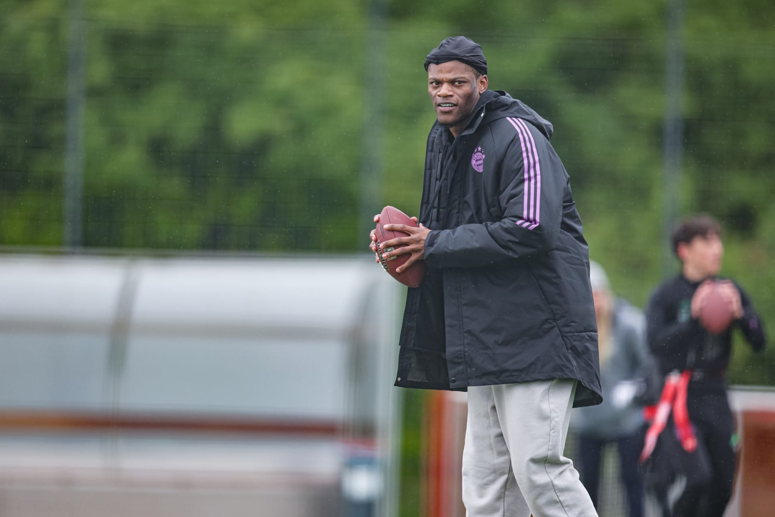 MUNICH, GERMANY - APRIL 21: Lamar Jackson leads the 'Flag Clinic' at FC Bayern Campus on April 21, 2024 in Munich, Germany. (Photo by Leonhard Simon/Getty Images) MUNICH, GERMANY - APRIL 21: Lamar Jackson leads the 'Flag Clinic' at FC Bayern Campus on April 21, 2024 in Munich, Germany. (Photo by Leonhard Simon/Getty Images)