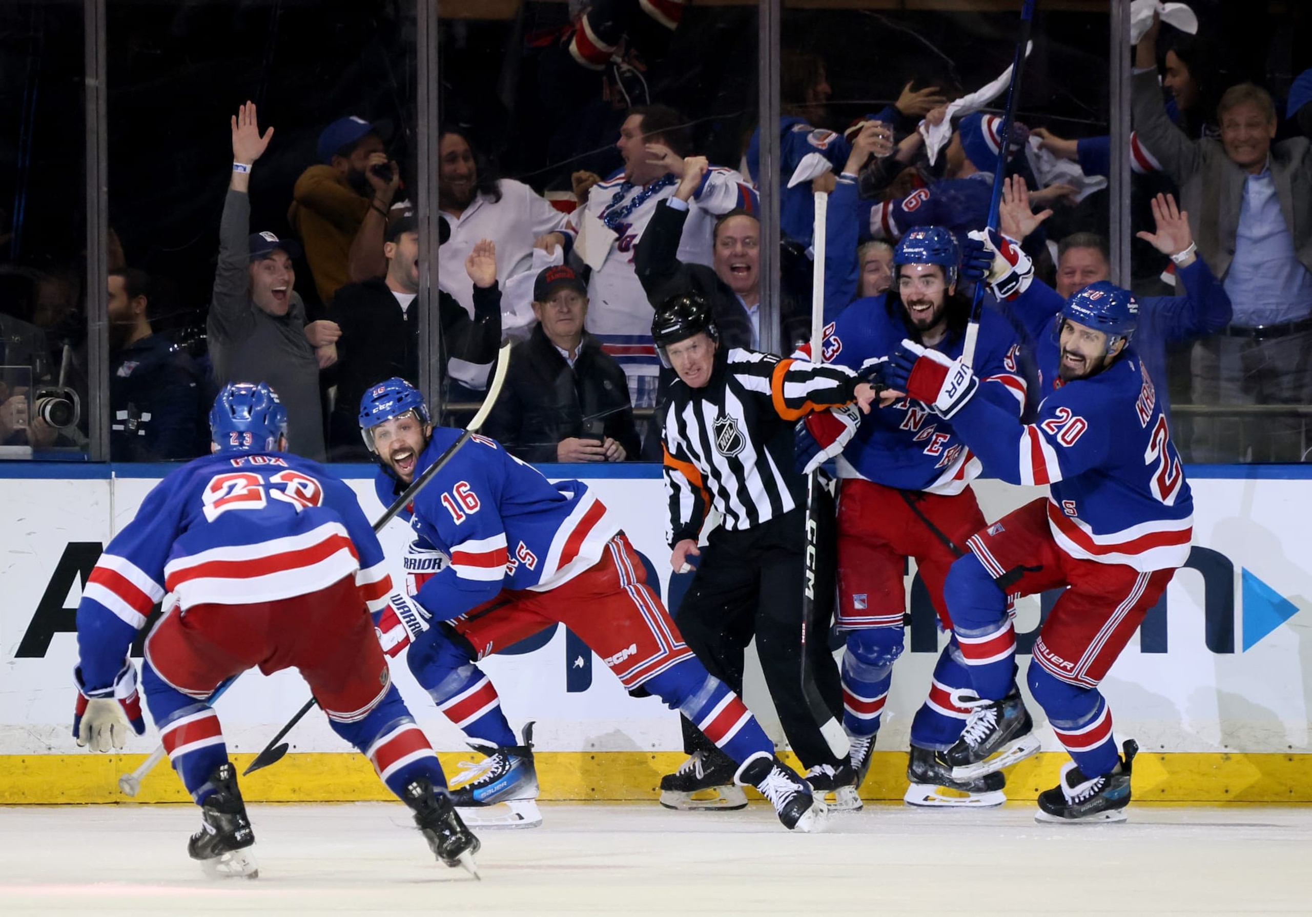NEW YORK, NEW YORK - MAY 07: Vincent Trocheck #16 of the New York Rangers celebrates with teammates after scoring the winning goal in the second overtime against the Carolina Hurricanes in Game Two of the Second Round of the 2024 Stanley Cup Playoffs at Madison Square Garden on May 07, 2024 in New York City. (Photo by Bruce Bennett/Getty Images)