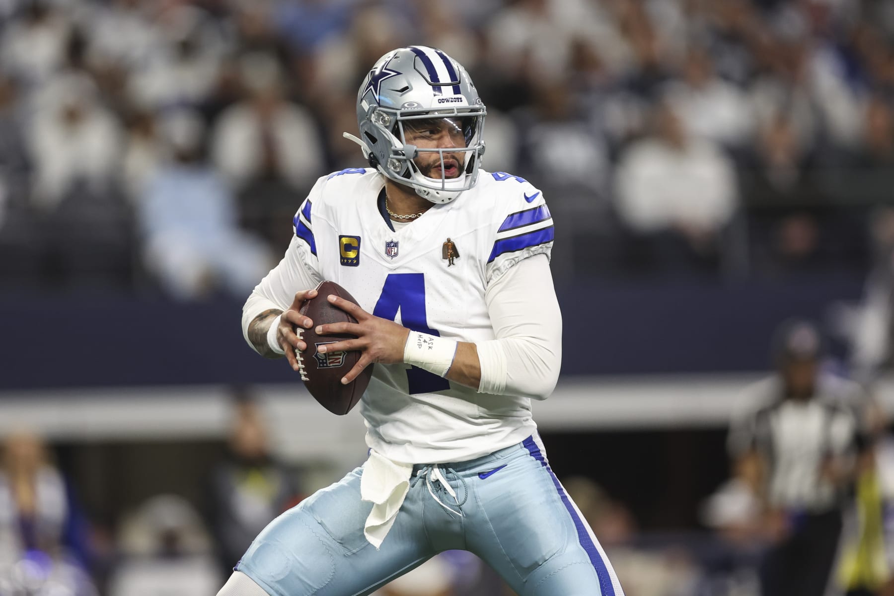 ARLINGTON, TX - JANUARY 14: Dak Prescott #4 of the Dallas Cowboys drops back to pass during an NFL wild-card playoff football game against the Green Bay Packers at AT&T Stadium on January 14, 2024 in Arlington, Texas. (Photo by Perry Knotts/Getty Images)