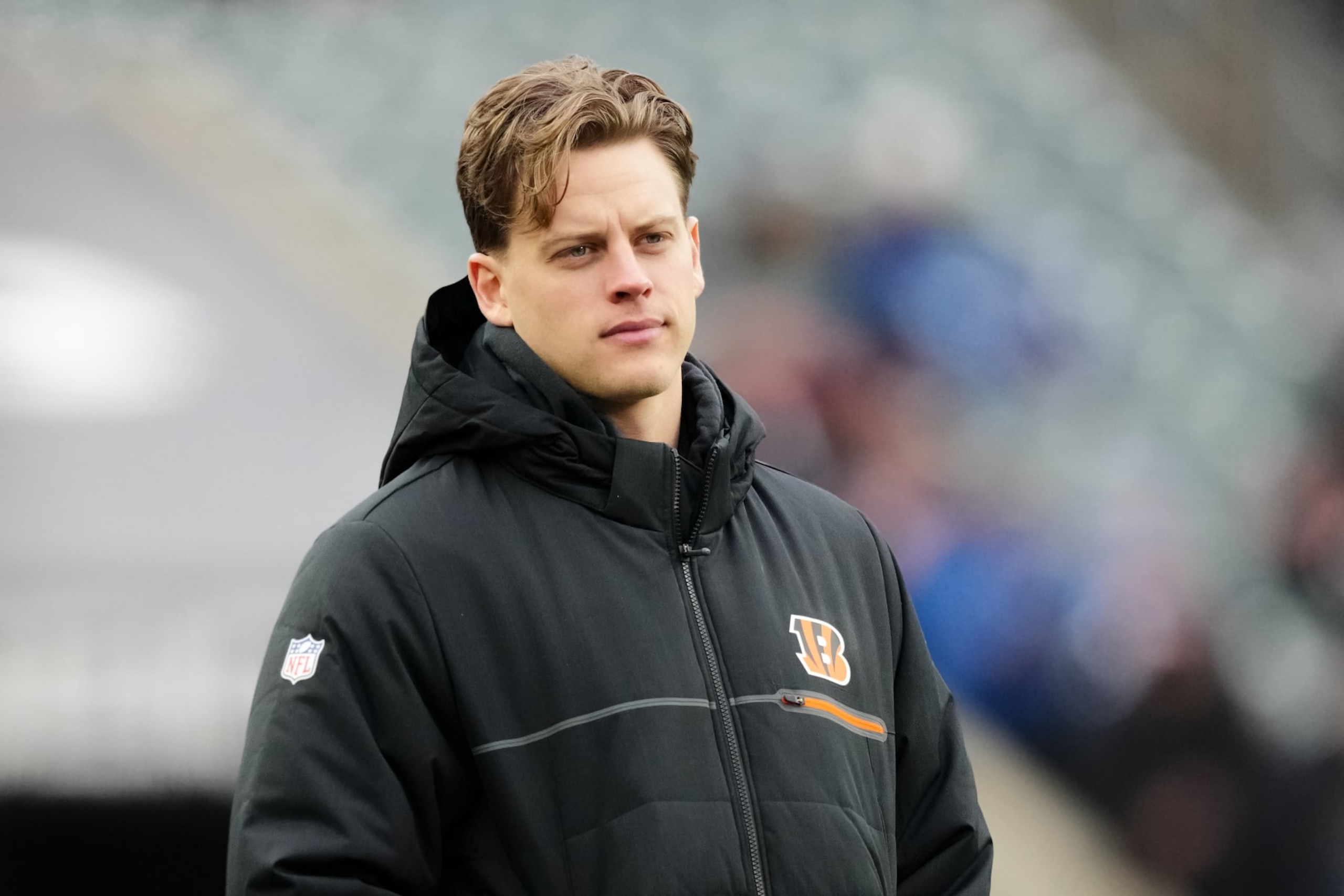 CINCINNATI, OHIO - DECEMBER 10: Joe Burrow #9 of the Cincinnati Bengals looks on before the game against the Indianapolis Colts at Paycor Stadium on December 10, 2023 in Cincinnati, Ohio. (Photo by Dylan Buell/Getty Images) CINCINNATI, OHIO - DECEMBER 10: Joe Burrow #9 of the Cincinnati Bengals looks on before the game against the Indianapolis Colts at Paycor Stadium on December 10, 2023 in Cincinnati, Ohio. (Photo by Dylan Buell/Getty Images)