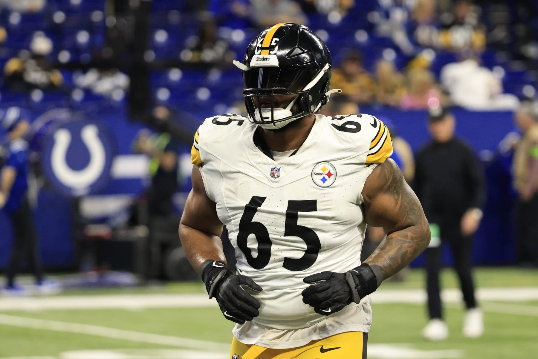 INDIANAPOLIS, INDIANA - DECEMBER 16: Dan Moore Jr. #65 of the Pittsburgh Steelers warms up prior to the game against the Indianapolis Colts at Lucas Oil Stadium on December 16, 2023 in Indianapolis, Indiana. (Photo by Justin Casterline/Getty Images)