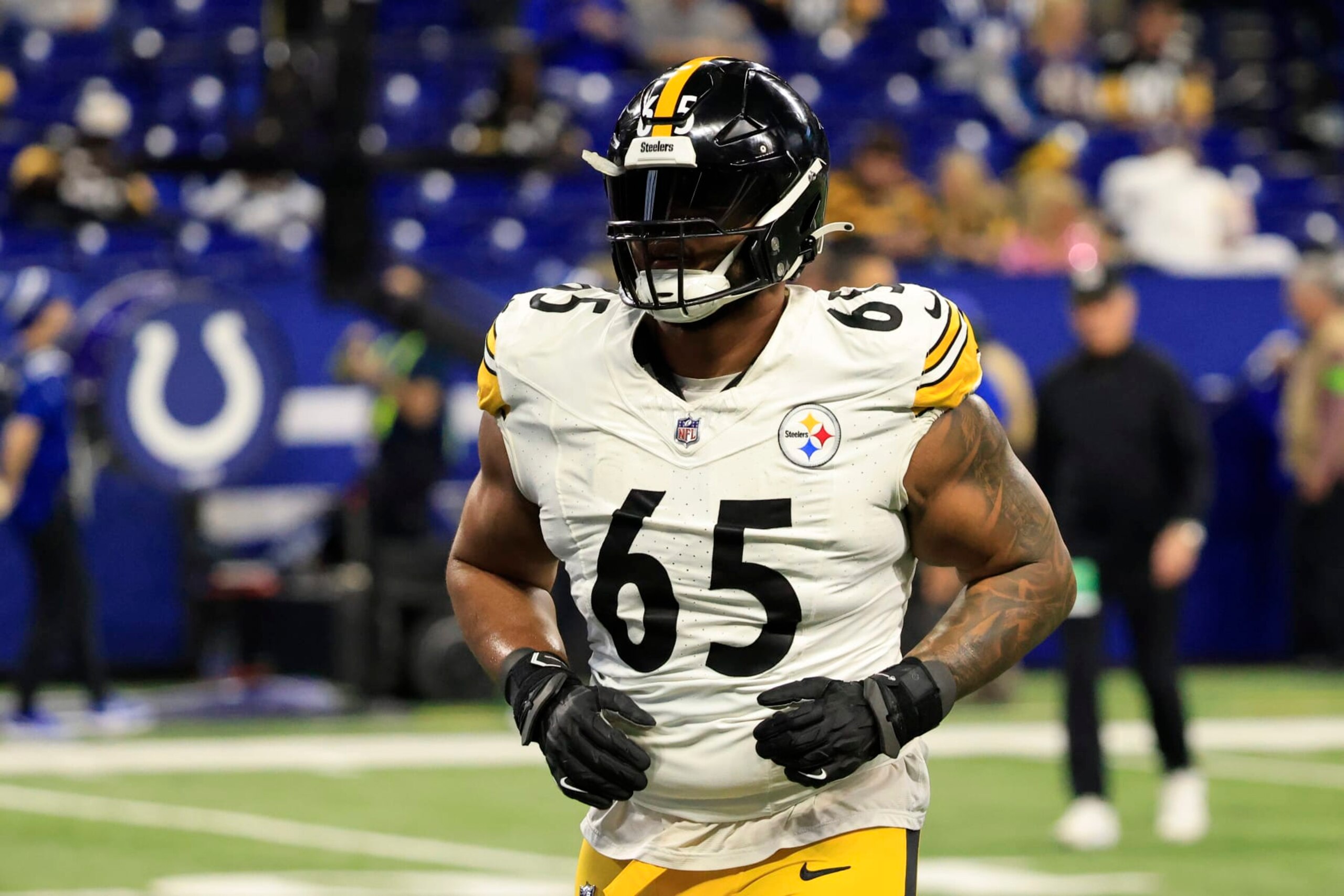 INDIANAPOLIS, INDIANA - DECEMBER 16: Dan Moore Jr. #65 of the Pittsburgh Steelers warms up prior to the game against the Indianapolis Colts at Lucas Oil Stadium on December 16, 2023 in Indianapolis, Indiana. (Photo by Justin Casterline/Getty Images)