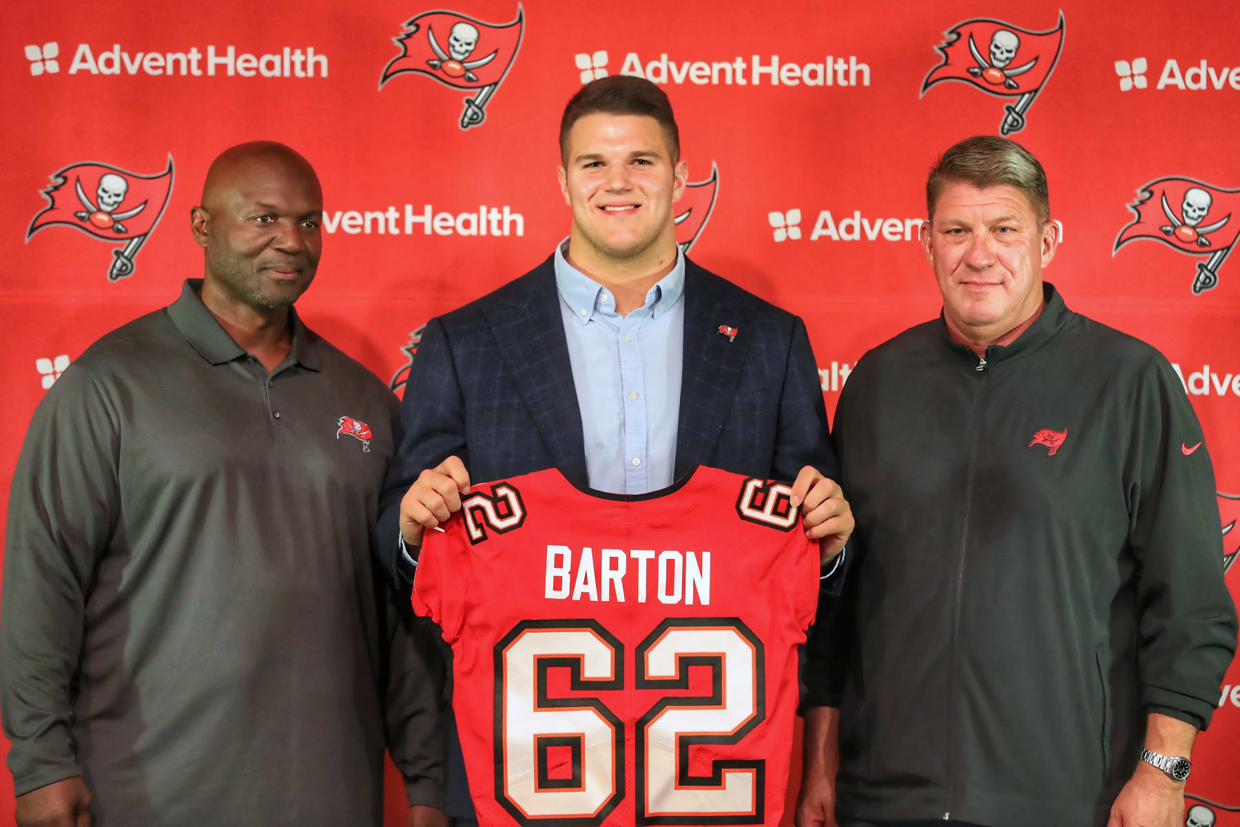 TAMPA, FL - MAY 12: Tampa Bay Buccaneers 2024 first round pick offensive lineman Graham Barton (62) is flanked by Head Coach Todd Bowles and General Manager Jason Licht during the Tampa Bay Buccaneers First Round Pick Press Conference on April 26, 2024 at the AdventHealth Training Center at One Buccaneer Place in Tampa, Florida. (Photo by Cliff Welch/Icon Sportswire via Getty Images)