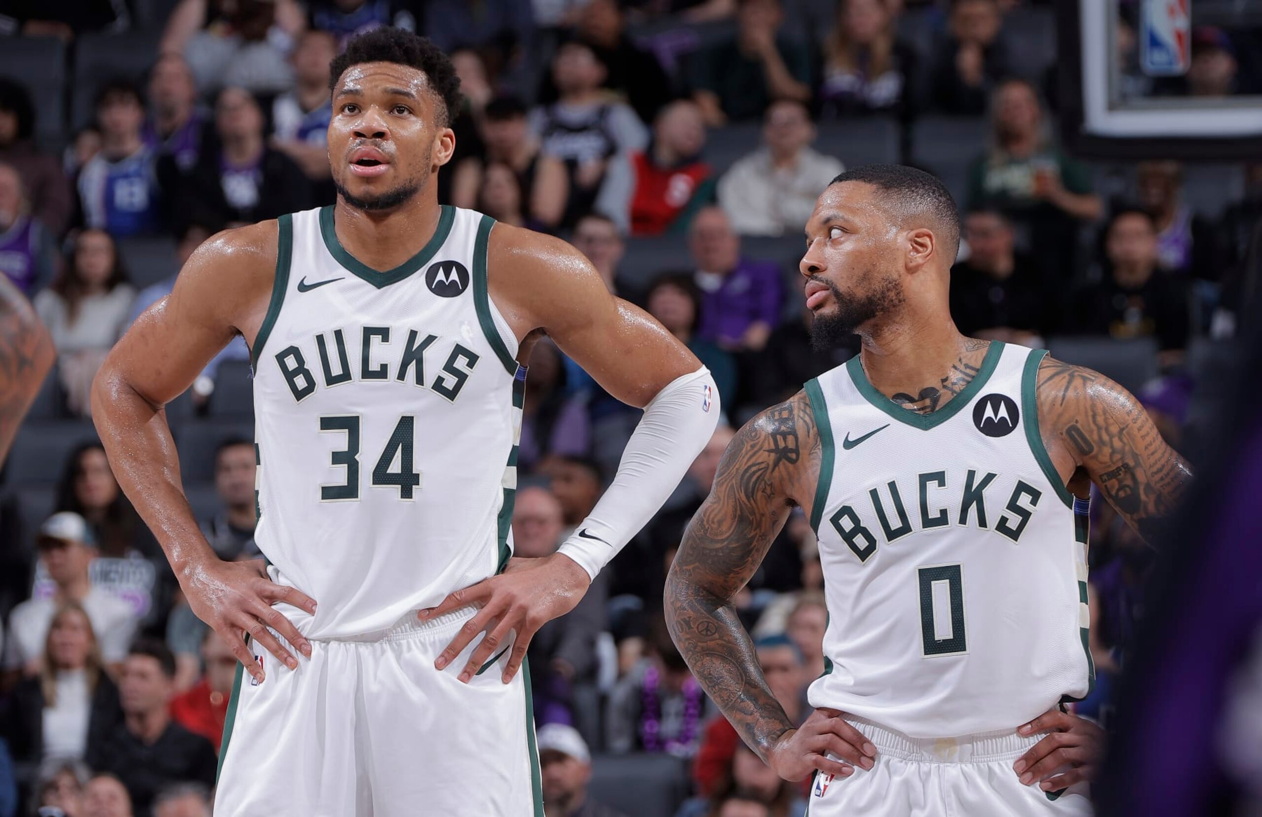 SACRAMENTO, CA - MARCH 12: Giannis Antetokounmpo #34 and Damian Lillard #0 of the Milwaukee Bucks talk during the game against the Sacramento Kings on March 12, 2024 at Golden 1 Center in Sacramento, California. NOTE TO USER: User expressly acknowledges and agrees that, by downloading and or using this photograph, User is consenting to the terms and conditions of the Getty Images Agreement. Mandatory Copyright Notice: Copyright 2024 NBAE (Photo by Rocky Widner/NBAE via Getty Images) SACRAMENTO, CA - MARCH 12: Giannis Antetokounmpo #34 and Damian Lillard #0 of the Milwaukee Bucks talk during the game against the Sacramento Kings on March 12, 2024 at Golden 1 Center in Sacramento, California. NOTE TO USER: User expressly acknowledges and agrees that, by downloading and or using this photograph, User is consenting to the terms and conditions of the Getty Images Agreement. Mandatory Copyright Notice: Copyright 2024 NBAE (Photo by Rocky Widner/NBAE via Getty Images)