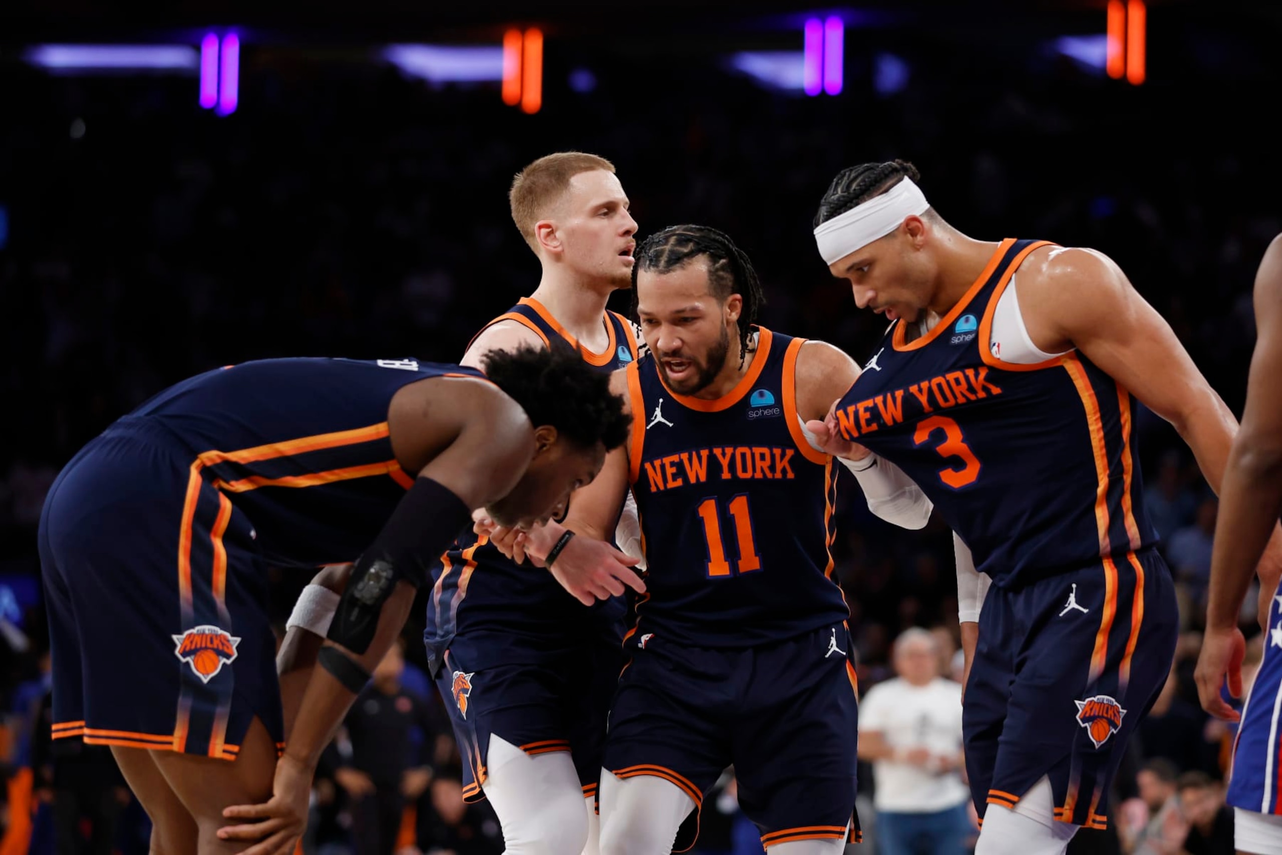 NEW YORK, NEW YORK - APRIL 22: OG Anunoby #8, Josh Hart #3, Jalen Brunson #11, and Donte DiVincenzo #0 of the New York Knicks talk during the second half against the Philadelphia 76ers in Game Two of the Eastern Conference First Round Playoffs at Madison Square Garden on April 22, 2024 in New York City. The Knicks won 104-101. NOTE TO USER: User expressly acknowledges and agrees that, by downloading and or using this photograph, User is consenting to the terms and conditions of the Getty Images License Agreement. (Photo by Sarah Stier/Getty Images) NEW YORK, NEW YORK - APRIL 22: OG Anunoby #8, Josh Hart #3, Jalen Brunson #11, and Donte DiVincenzo #0 of the New York Knicks talk during the second half against the Philadelphia 76ers in Game Two of the Eastern Conference First Round Playoffs at Madison Square Garden on April 22, 2024 in New York City. The Knicks won 104-101. NOTE TO USER: User expressly acknowledges and agrees that, by downloading and or using this photograph, User is consenting to the terms and conditions of the Getty Images License Agreement. (Photo by Sarah Stier/Getty Images)