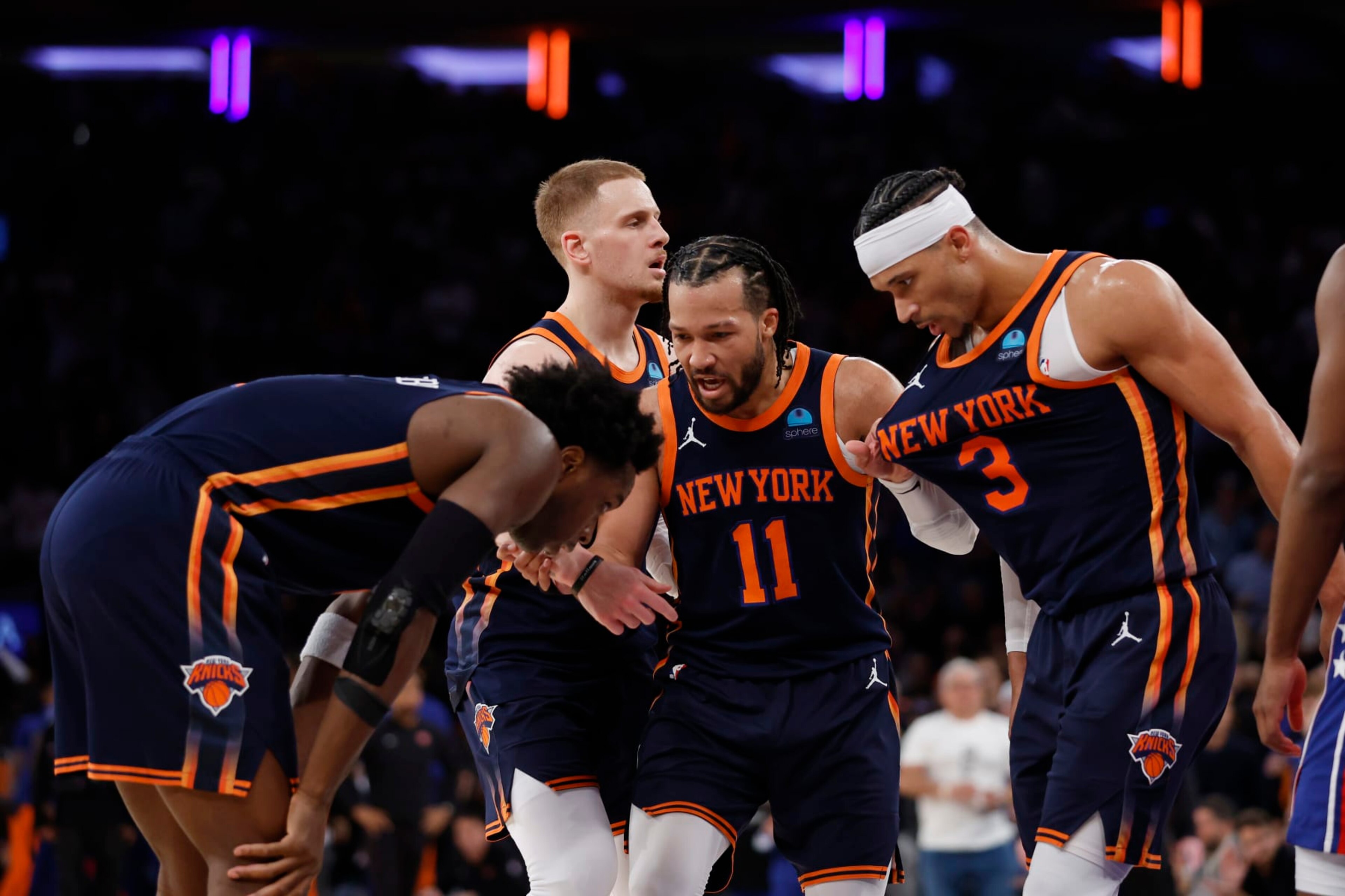 NEW YORK, NEW YORK - APRIL 22: OG Anunoby #8, Josh Hart #3, Jalen Brunson #11, and Donte DiVincenzo #0 of the New York Knicks talk during the second half against the Philadelphia 76ers in Game Two of the Eastern Conference First Round Playoffs at Madison Square Garden on April 22, 2024 in New York City. The Knicks won 104-101. NOTE TO USER: User expressly acknowledges and agrees that, by downloading and or using this photograph, User is consenting to the terms and conditions of the Getty Images License Agreement. (Photo by Sarah Stier/Getty Images) NEW YORK, NEW YORK - APRIL 22: OG Anunoby #8, Josh Hart #3, Jalen Brunson #11, and Donte DiVincenzo #0 of the New York Knicks talk during the second half against the Philadelphia 76ers in Game Two of the Eastern Conference First Round Playoffs at Madison Square Garden on April 22, 2024 in New York City. The Knicks won 104-101. NOTE TO USER: User expressly acknowledges and agrees that, by downloading and or using this photograph, User is consenting to the terms and conditions of the Getty Images License Agreement. (Photo by Sarah Stier/Getty Images)