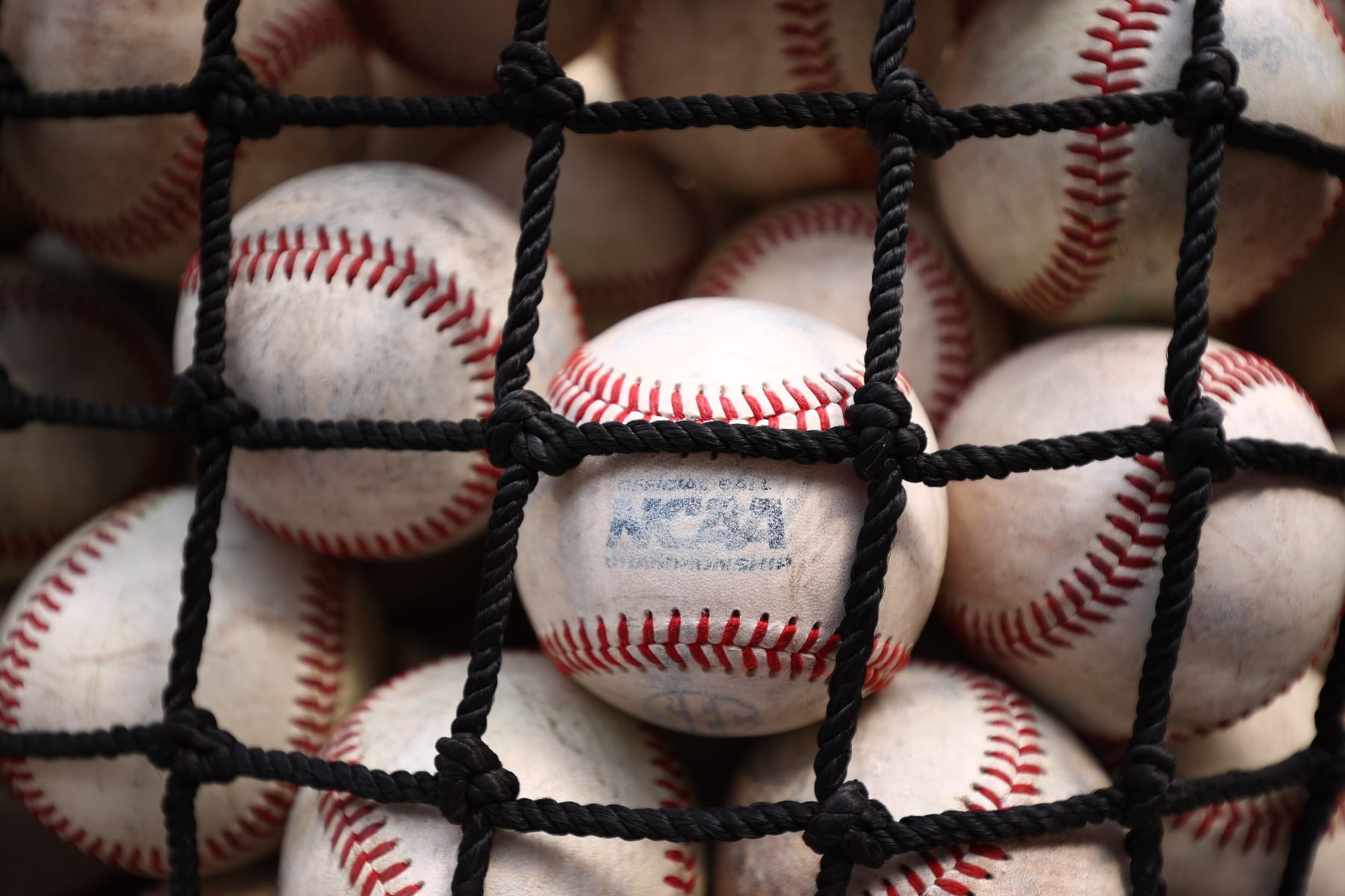 OMAHA, NE - JUNE 30: Baseballs rest in netting before the game between the Mississippi St. Bulldogs and the Vanderbilt Commodores during the Division I Men's Baseball Championship held at TD Ameritrade Park Omaha on June 30, 2021 in Omaha, Nebraska. (Photo by Jamie Schwaberow/NCAA Photos via Getty Images) OMAHA, NE - JUNE 30: Baseballs rest in netting before the game between the Mississippi St. Bulldogs and the Vanderbilt Commodores during the Division I Men's Baseball Championship held at TD Ameritrade Park Omaha on June 30, 2021 in Omaha, Nebraska. (Photo by Jamie Schwaberow/NCAA Photos via Getty Images)