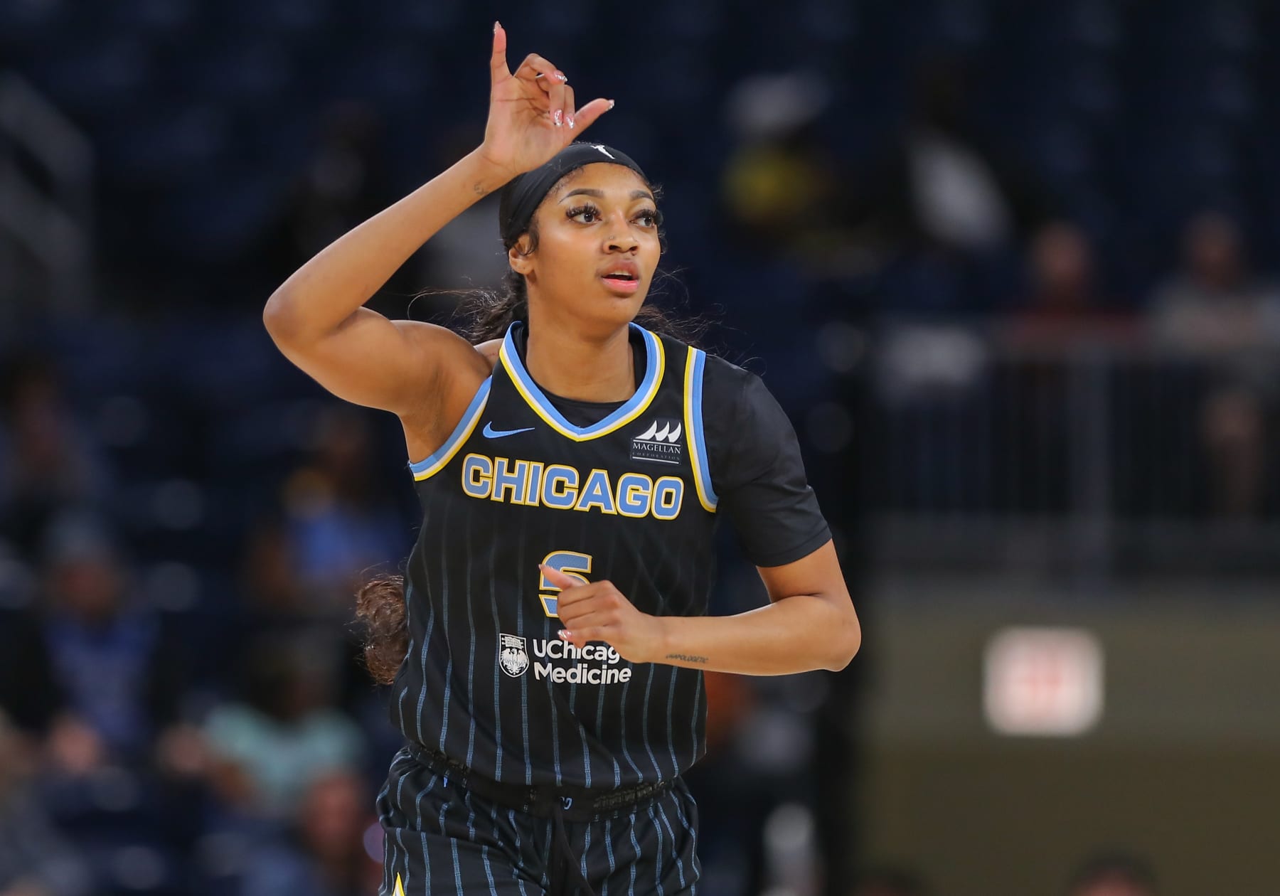CHICAGO, IL - MAY 07: Angel Reese #5 of the Chicago Sky reacts after a play during a WNBA preseason game in the first half  against the New York Liberty at Wintrust Arena on May 7, 2024 in Chicago, Illinois. (Photo by Melissa Tamez/Icon Sportswire via Getty Images)
