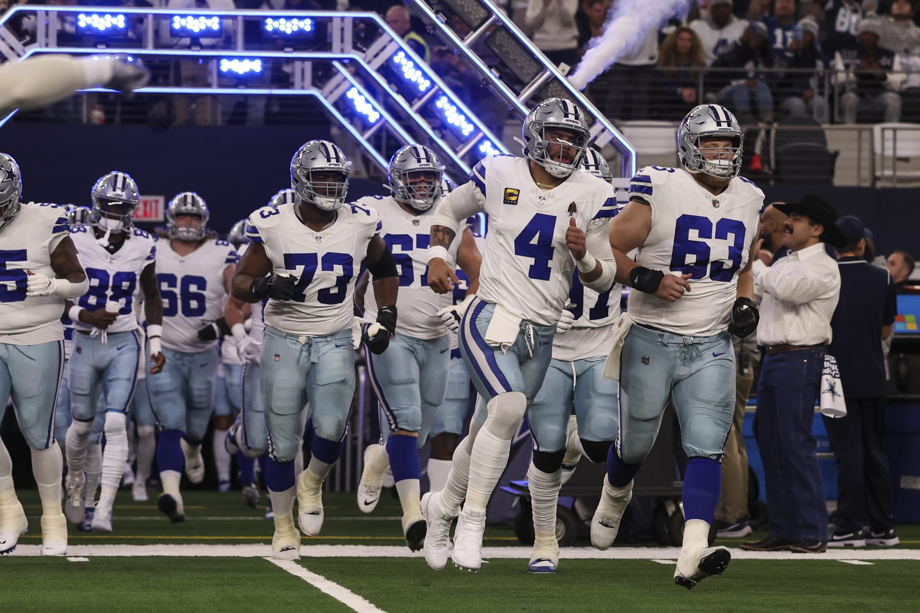 ARLINGTON, TX - JANUARY 14: Dak Prescott #4 of the Dallas Cowboys runs out of the tunnel prior to an NFL wild-card playoff football game against the Green Bay Packers at AT&T Stadium on January 14, 2024 in Arlington, Texas. (Photo by Perry Knotts/Getty Images)