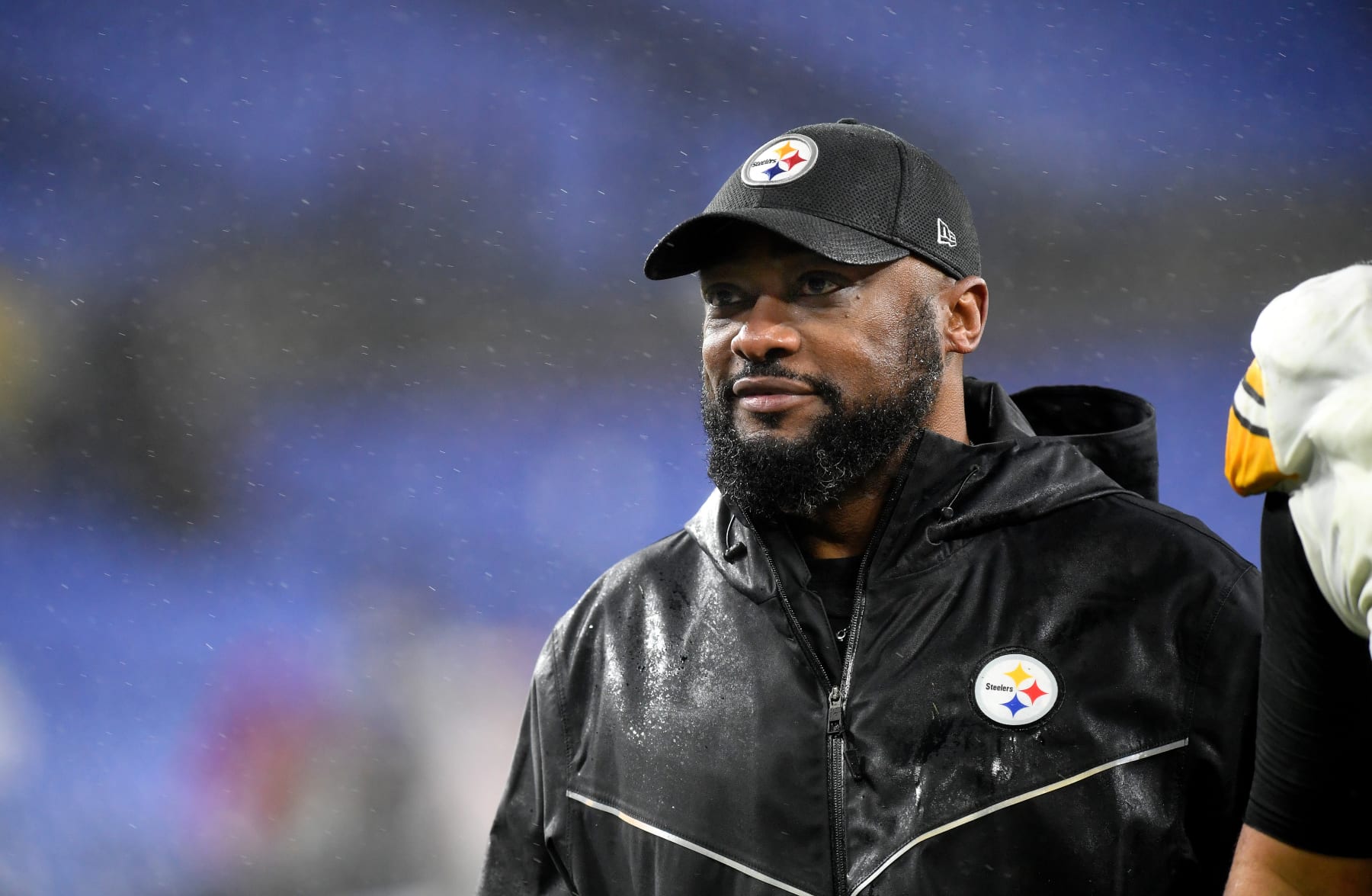 BALTIMORE, MD - JANUARY 06: Steelers head coach Mike Tomlin smiles while walking off the field after the Pittsburgh Steelers versus Baltimore Ravens NFL game at M&T Bank Stadium on January 6, 2024 in Baltimore, MD. (Photo by Randy Litzinger/Icon Sportswire via Getty Images)