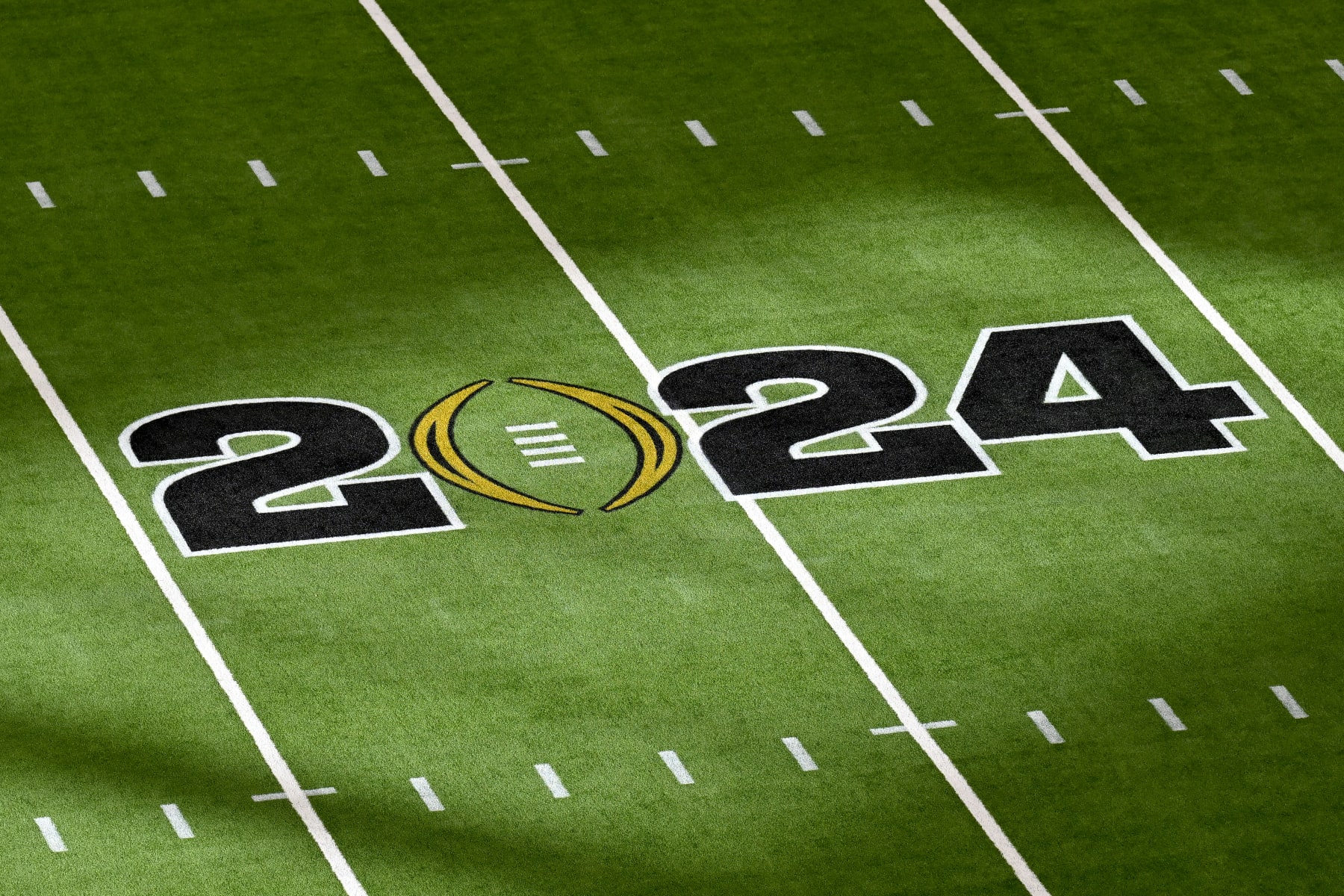 HOUSTON, TEXAS - JANUARY 08: A general view of the field logo before the 2024 CFP National Championship game between the Michigan Wolverines and the Washington Huskies at NRG Stadium on January 08, 2024 in Houston, Texas. (Photo by Alika Jenner/Getty Images)