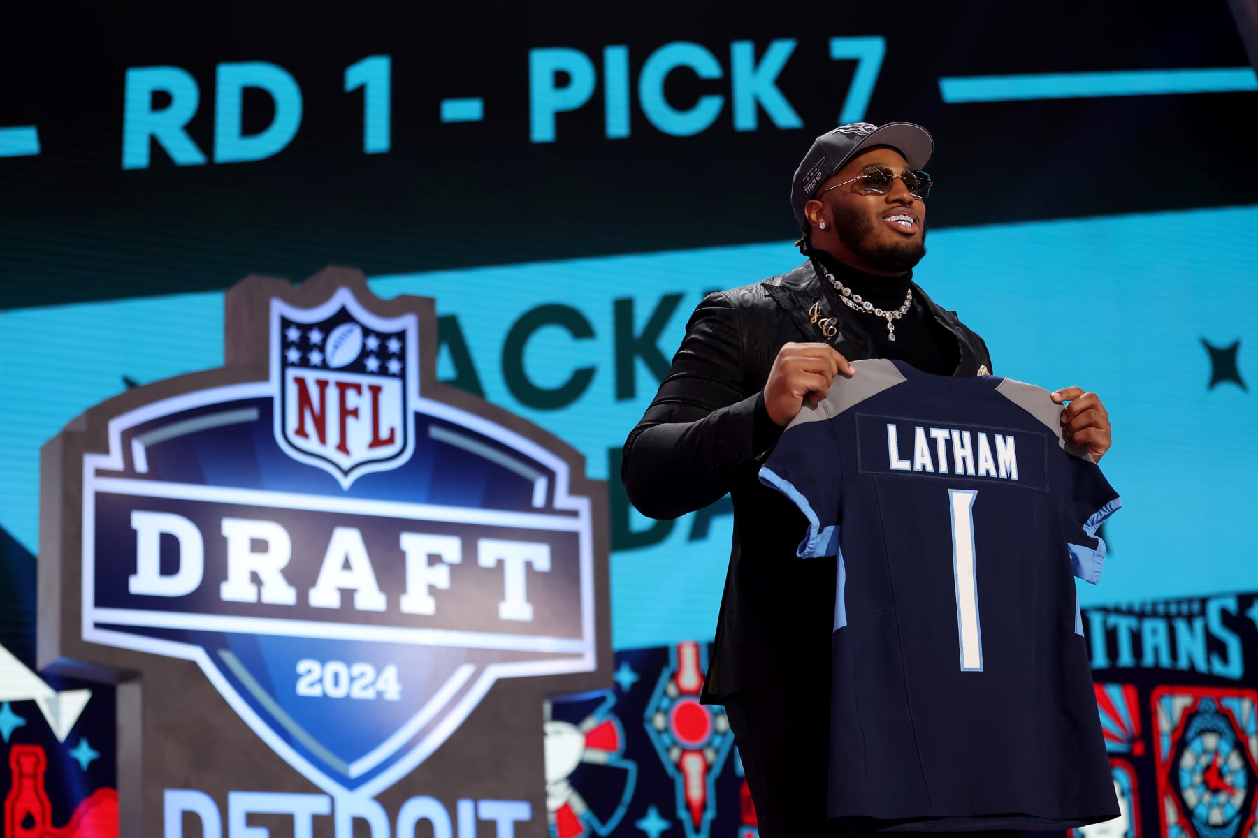 DETROIT, MICHIGAN - APRIL 25: JC Latham celebrates after being selected seventh overall by the Tennessee Titans during the first round of the 2024 NFL Draft at Campus Martius Park and Hart Plaza on April 25, 2024 in Detroit, Michigan. (Photo by Gregory Shamus/Getty Images)