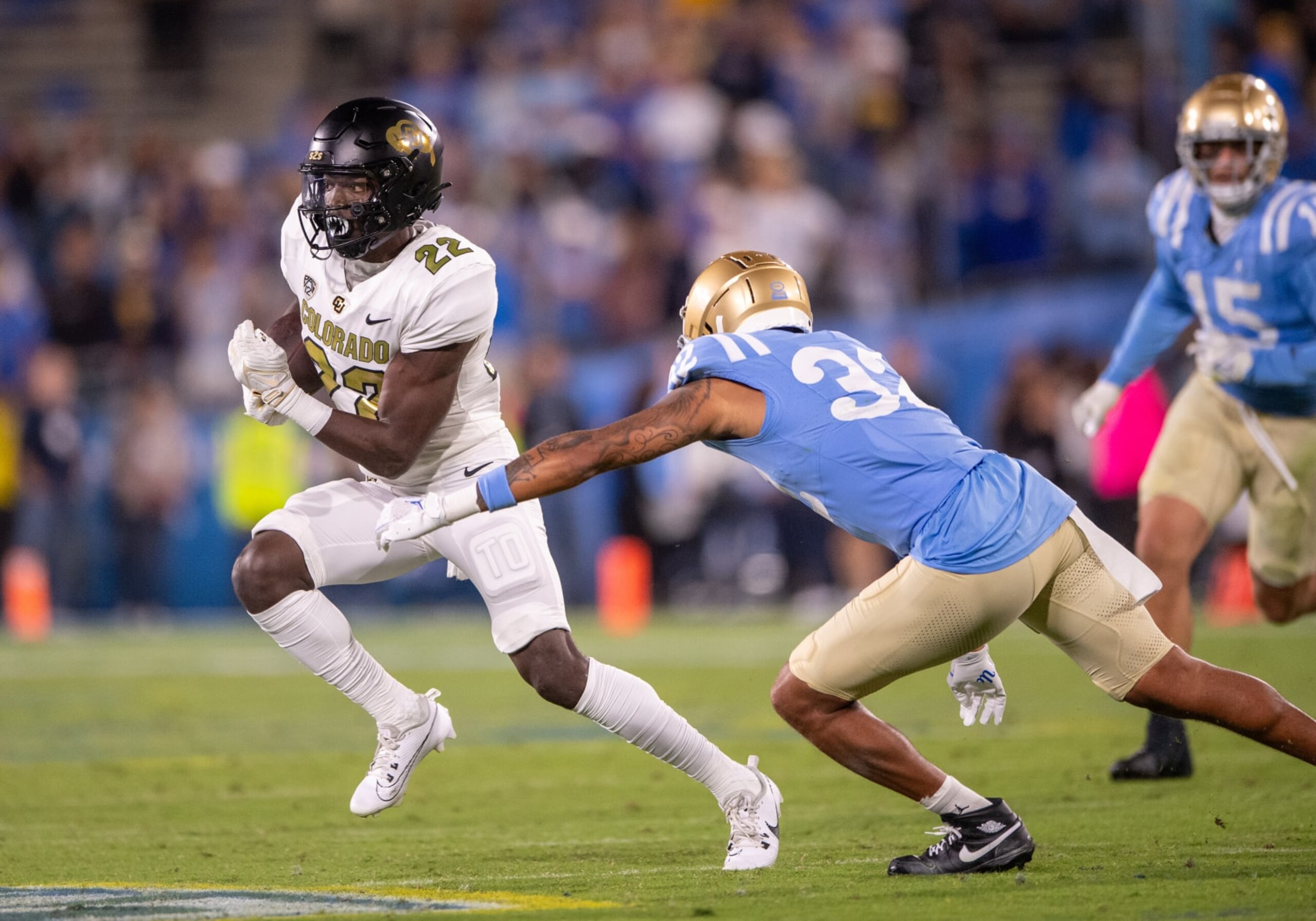 PASADENA, CA - OCTOBER 28: Colorado Buffaloes running back Alton McCaskill (22) rushes with the ball during the game between the Colorado Buffalos and the UCLA Bruins on October 28, 2023, at Rose Bowl Stadium in Pasadena, CA. (Photo by David Dennis/Icon Sportswire via Getty Images) PASADENA, CA - OCTOBER 28: Colorado Buffaloes running back Alton McCaskill (22) rushes with the ball during the game between the Colorado Buffalos and the UCLA Bruins on October 28, 2023, at Rose Bowl Stadium in Pasadena, CA. (Photo by David Dennis/Icon Sportswire via Getty Images)