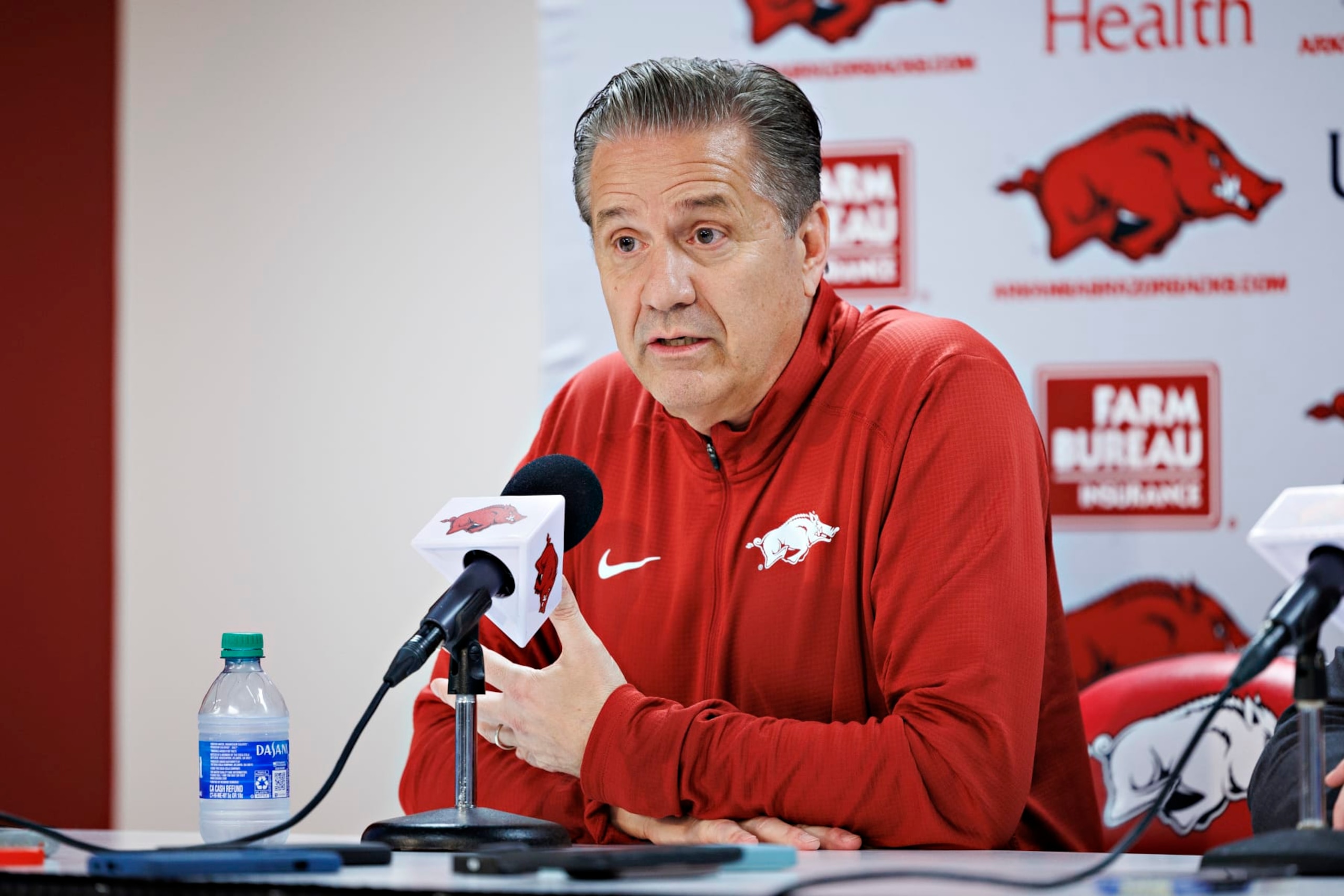 FAYETTEVILLE, ARKANSAS - APRIL 10: New Arkansas Razorbacks basketball head coach John Calipari holds his first news conference after his introduction at Bud Walton Arena on April 10, 2024 in Fayetteville, Arkansas. (Photo by Wesley Hitt/Getty Images) FAYETTEVILLE, ARKANSAS - APRIL 10: New Arkansas Razorbacks basketball head coach John Calipari holds his first news conference after his introduction at Bud Walton Arena on April 10, 2024 in Fayetteville, Arkansas. (Photo by Wesley Hitt/Getty Images)