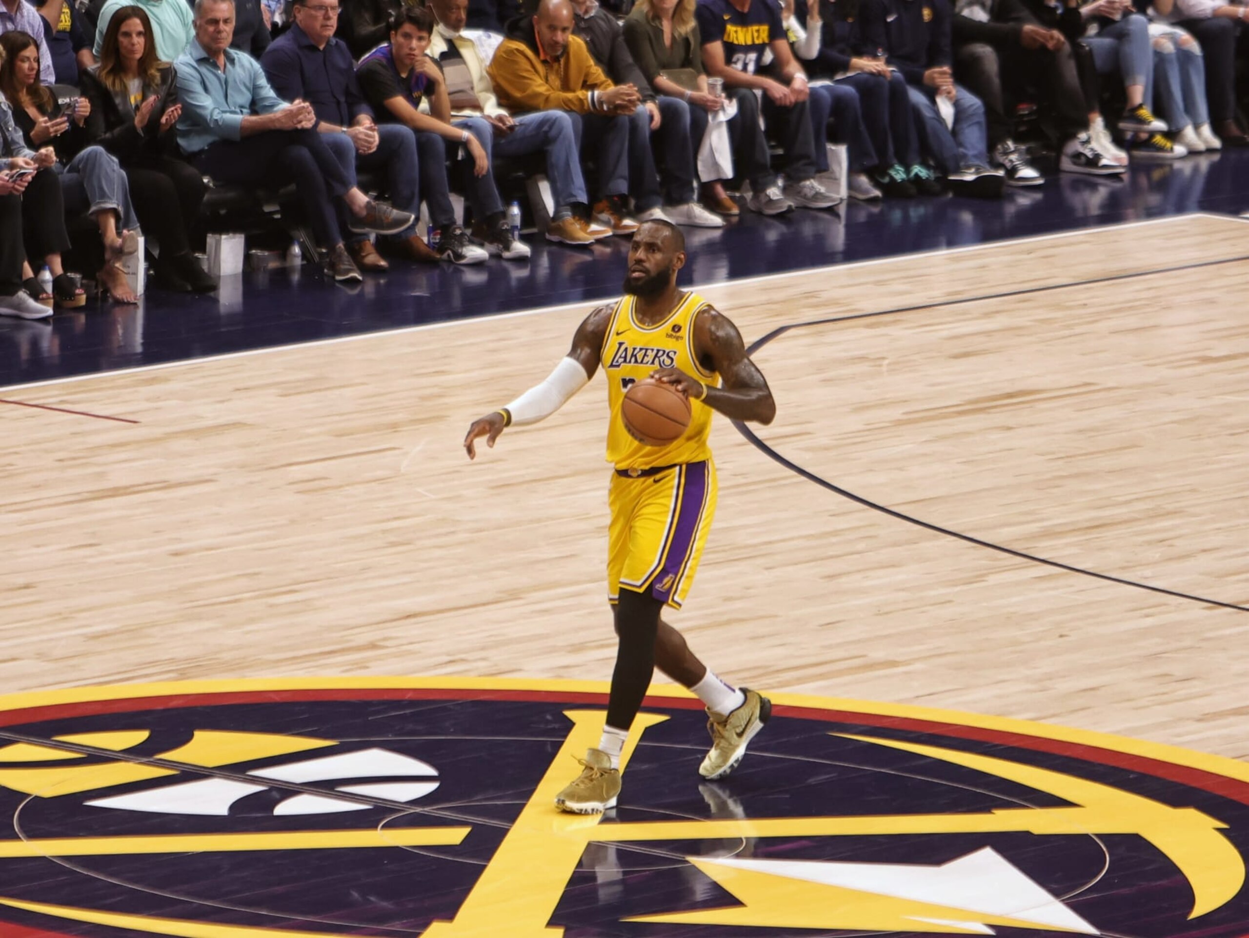 DENVER, CO - APRIL 29: LeBron James #23 of the Los Angeles Lakers brings the ball up court during the game against the Denver Nuggets during Round 1 Game 5 on April 29, 2024 at Ball Arena in Denver, Colorado. NOTE TO USER: User expressly acknowledges and agrees that, by downloading and/or using this Photograph, user is consenting to the terms and conditions of the Getty Images License Agreement. Mandatory Copyright Notice: Copyright 2024 NBAE (Photo by Jim Poorten/NBAE via Getty Images) DENVER, CO - APRIL 29: LeBron James #23 of the Los Angeles Lakers brings the ball up court during the game against the Denver Nuggets during Round 1 Game 5 on April 29, 2024 at Ball Arena in Denver, Colorado. NOTE TO USER: User expressly acknowledges and agrees that, by downloading and/or using this Photograph, user is consenting to the terms and conditions of the Getty Images License Agreement. Mandatory Copyright Notice: Copyright 2024 NBAE (Photo by Jim Poorten/NBAE via Getty Images)