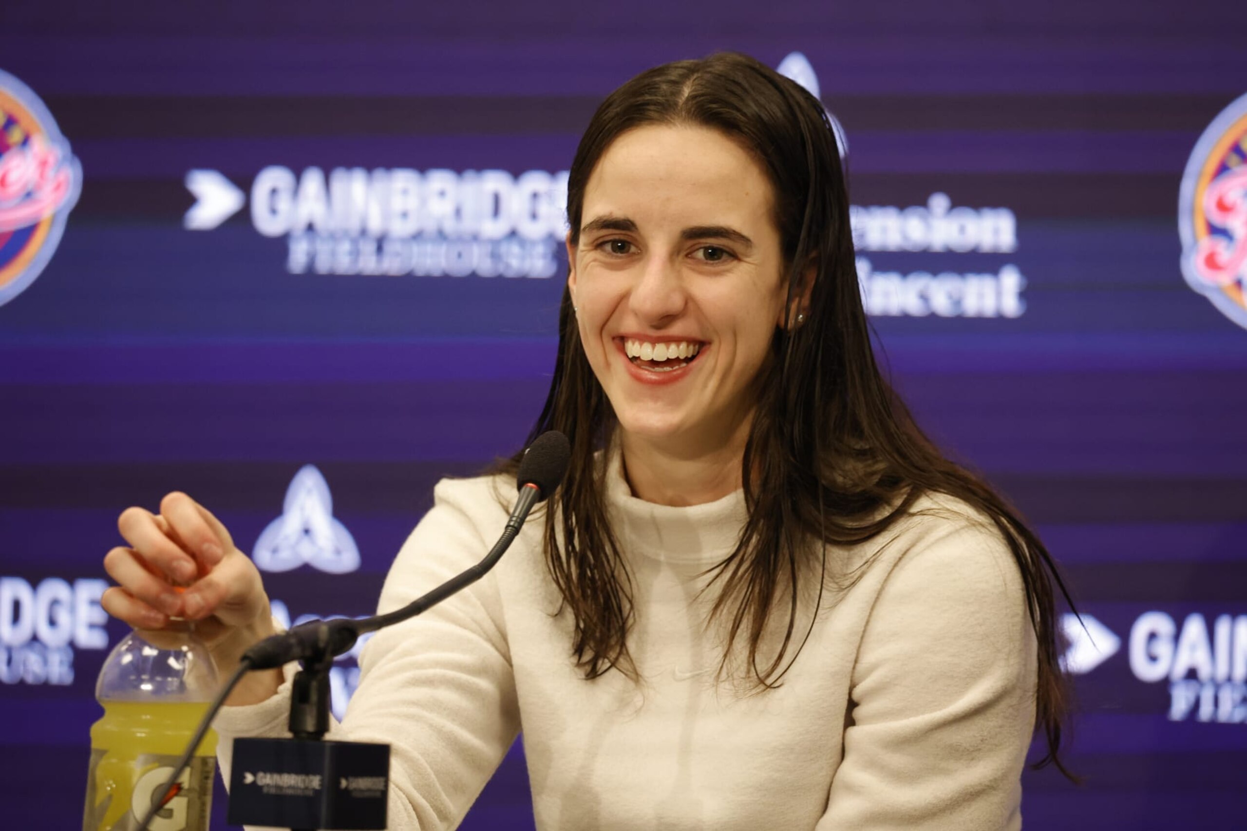 INDIANAPOLIS, IN - MAY 09: Indiana Fever guard Caitlin Clark (22) speaks to the media after a game against the Atlanta Dream during a WNBA preseason game on May 9, 2024, at Gainbridge Fieldhouse in Indianapolis, Indiana. (Photo by Brian Spurlock/Icon Sportswire via Getty Images)