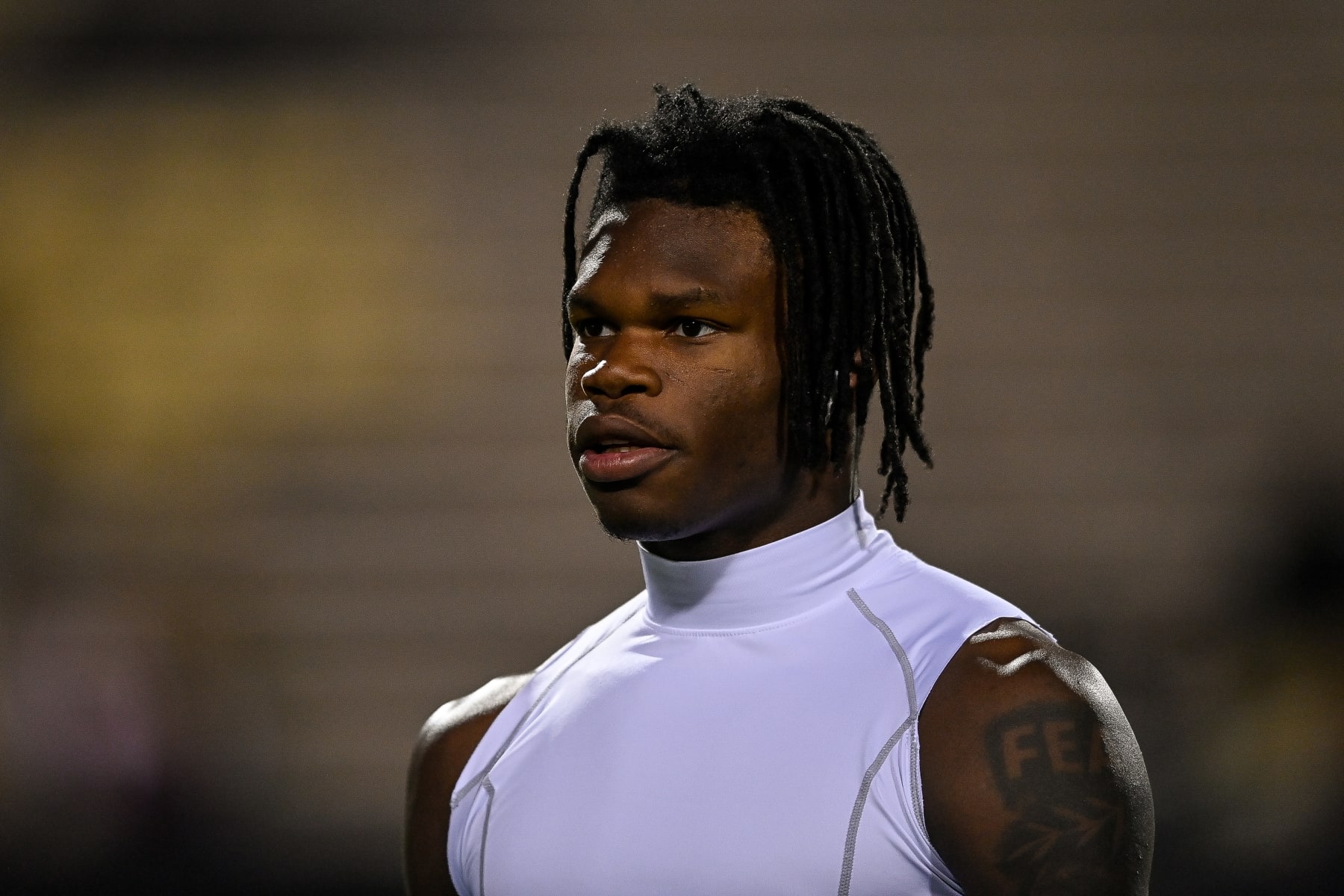 BOULDER, CO - NOVEMBER 4:  Cornerback Travis Hunter #12 of the Colorado Buffaloes warms up before a game against the Oregon State Beavers at Folsom Field on November 4, 2023 in Boulder, Colorado. (Photo by Dustin Bradford/Getty Images)