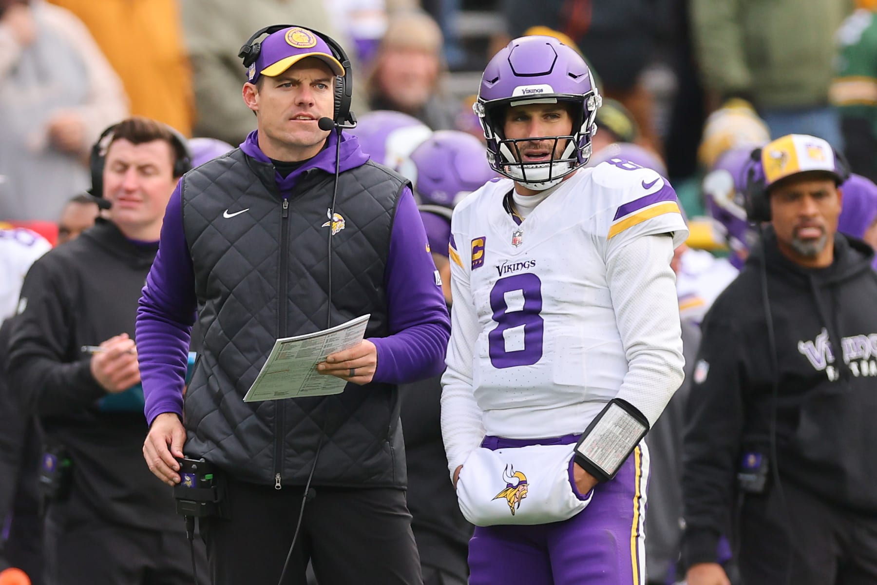 GREEN BAY, WISCONSIN - OCTOBER 29: Kirk Cousins #8 of the Minnesota Vikings talks with head coach Kevin O'Connell during the third quarter against the Minnesota Vikings at Lambeau Field on October 29, 2023 in Green Bay, Wisconsin. (Photo by Michael Reaves/Getty Images)