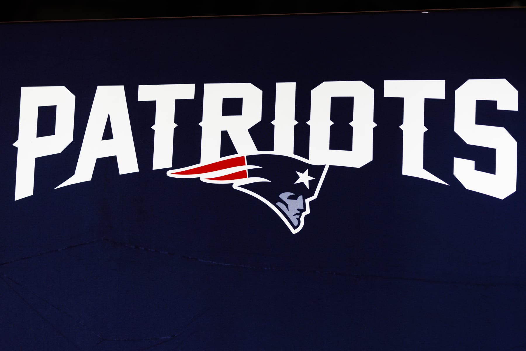 LOS ANGELES, CA - FEBRUARY 08: Detail view of the New England Patriots logo seen at the Super Bowl Experience on February 08, 2022, at the Los Angeles Convention Center in Los Angeles, CA. (Photo by Ric Tapia/Icon Sportswire via Getty Images)