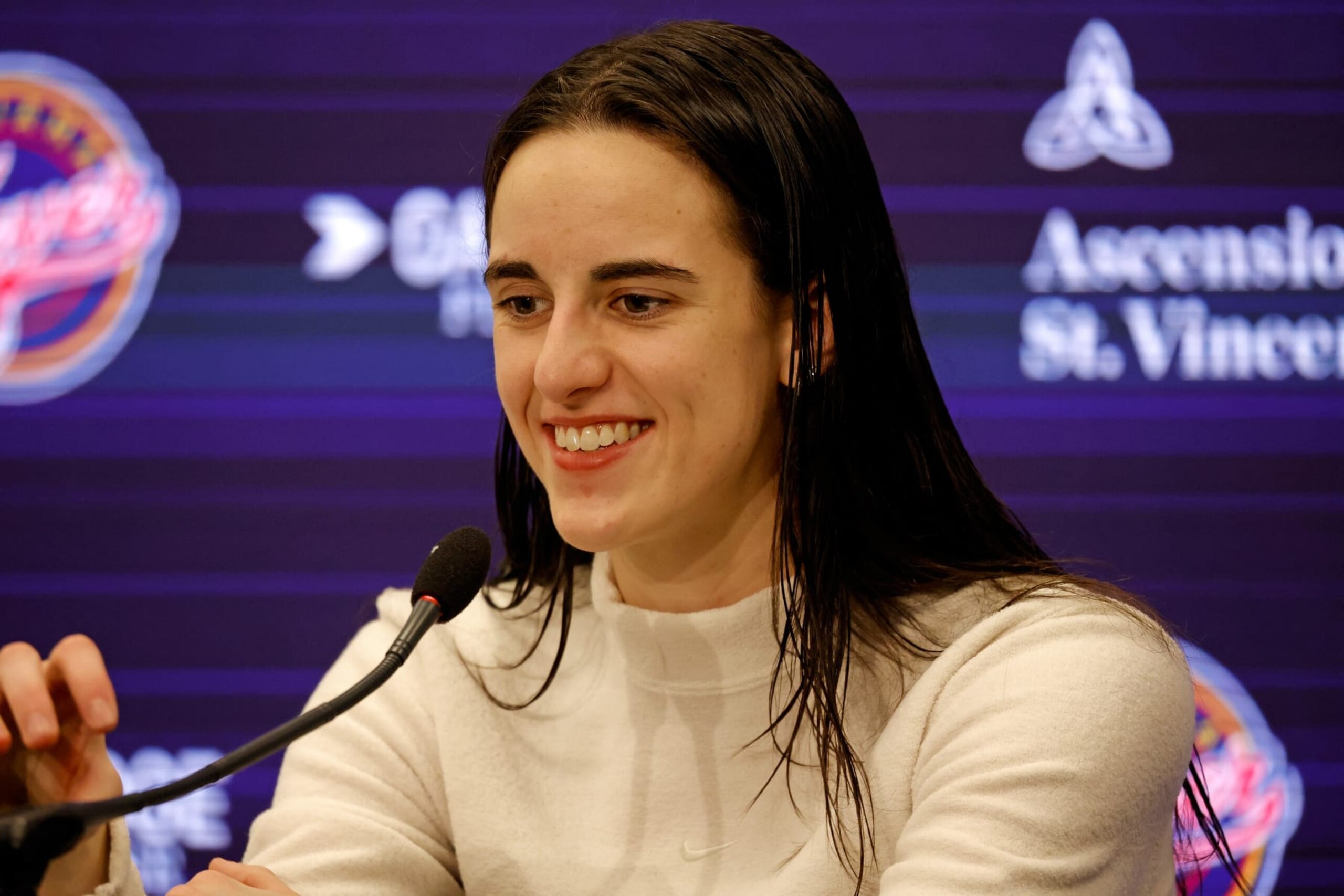 INDIANAPOLIS, IN - MAY 09: Indiana Fever guard Caitlin Clark (22) speaks to the media after a game against the Atlanta Dream during a WNBA preseason game on May 9, 2024, at Gainbridge Fieldhouse in Indianapolis, Indiana. (Photo by Brian Spurlock/Icon Sportswire via Getty Images)