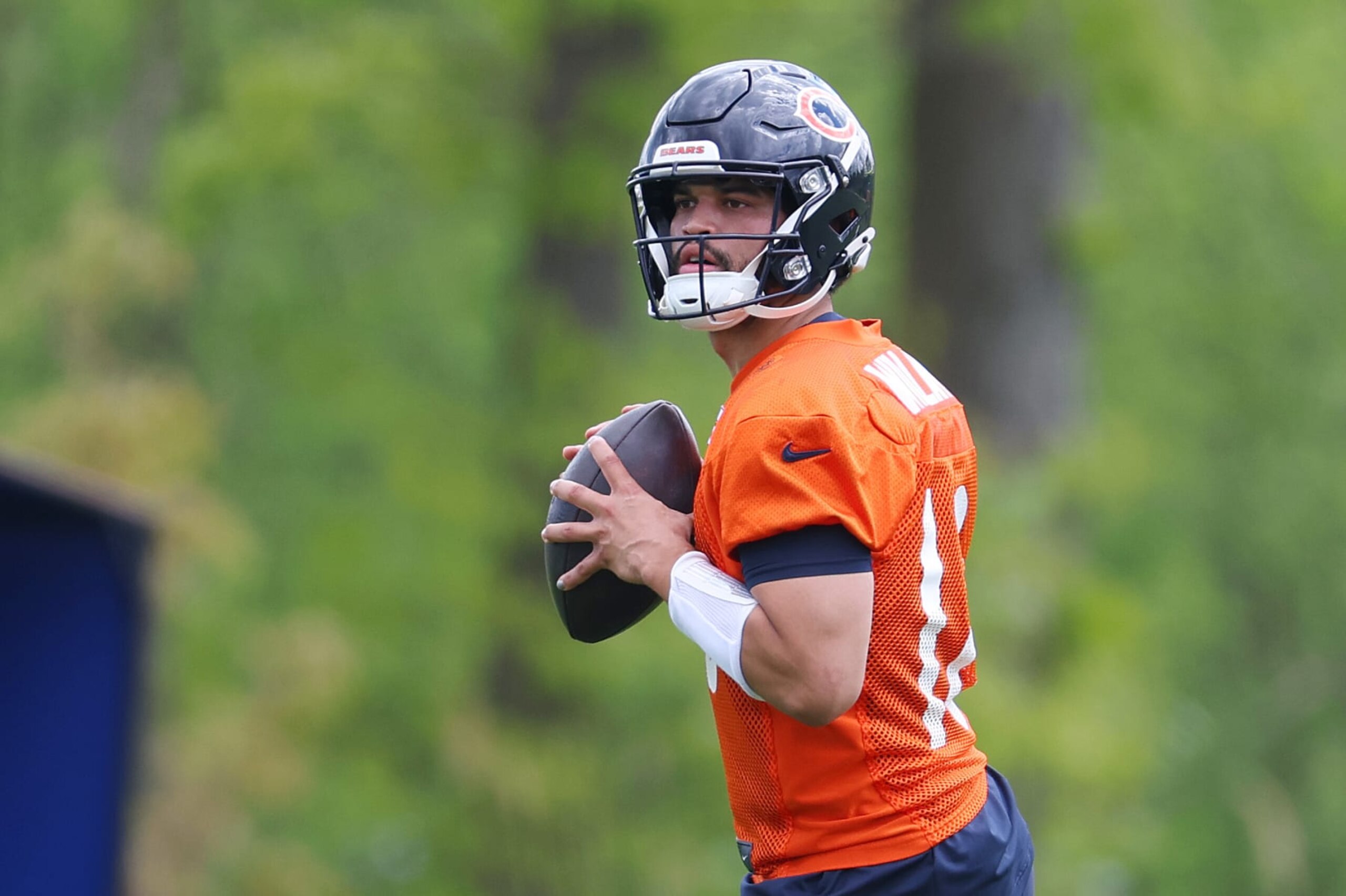 LAKE FOREST, ILLINOIS - MAY 10: Caleb Williams #18 of the Chicago Bears throws a pass during Chicago Bears Rookie Minicamp at Halas Hall on May 10, 2024 in Lake Forest, Illinois.  (Photo by Michael Reaves/Getty Images)