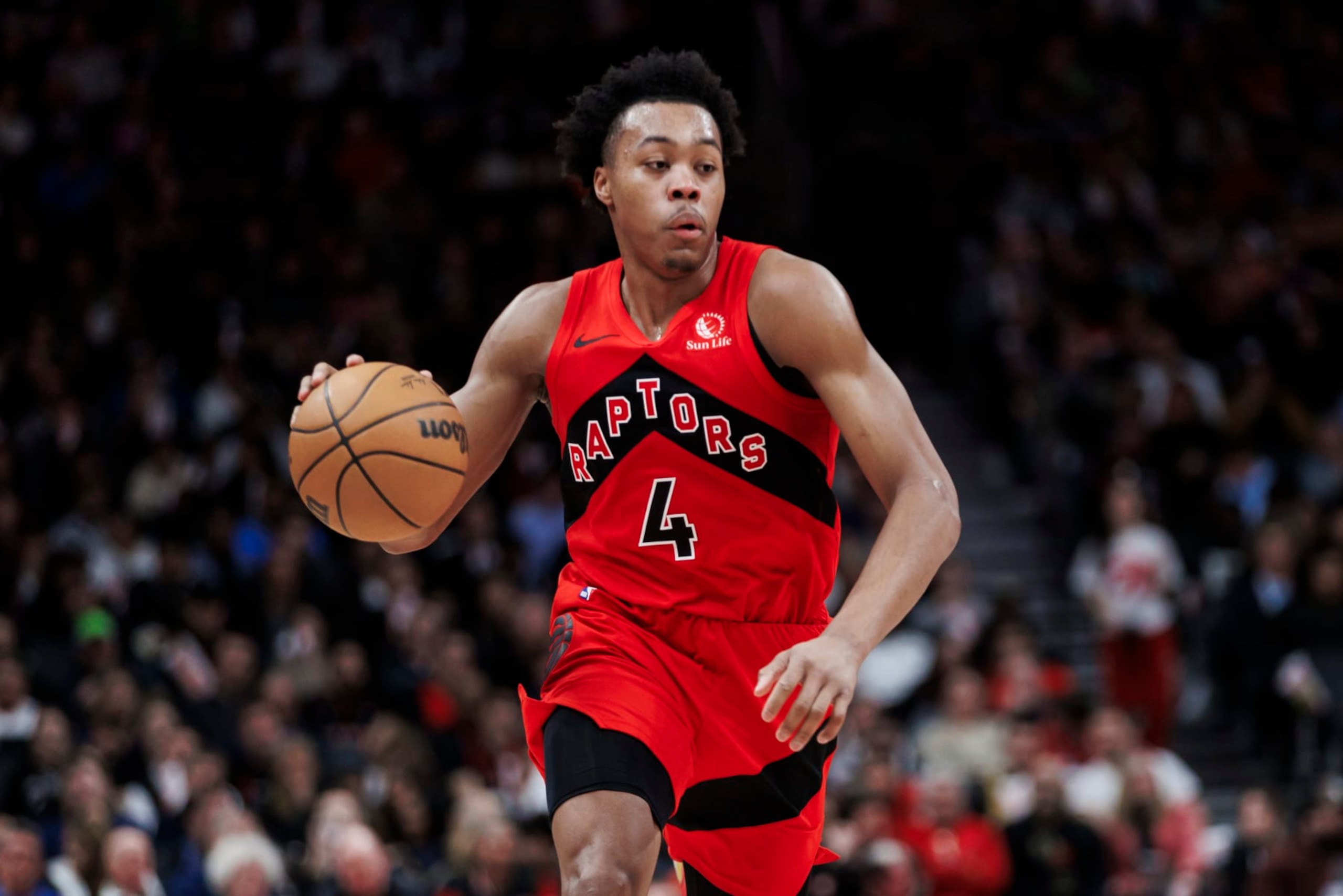 TORONTO, CANADA - FEBRUARY 28: Scottie Barnes #4 of the Toronto Raptors dribbles against the Dallas Mavericks in the second half of their NBA game at Scotiabank Arena on February 28, 2024 in Toronto, Canada. NOTE TO USER: User expressly acknowledges and agrees that, by downloading and or using this photograph, User is consenting to the terms and conditions of the Getty Images License Agreement. (Photo by Cole Burston/Getty Images)