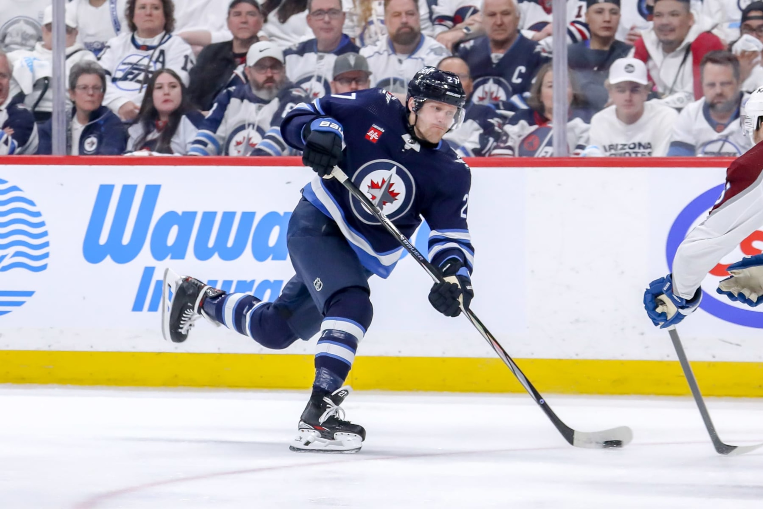 WINNIPEG, CANADA - APRIL 30: Nikolaj Ehlers #27 of the Winnipeg Jets gets set to take a shot on goal during third period action against the Colorado Avalanche in Game Five of the First Round of the 2024 Stanley Cup Playoffs at the Canada Life Centre on April 30, 2024 in Winnipeg, Manitoba, Canada. The Avs defeated the Jets 6-3 and win the series 4-1. (Photo by Darcy Finley/NHLI via Getty Images)