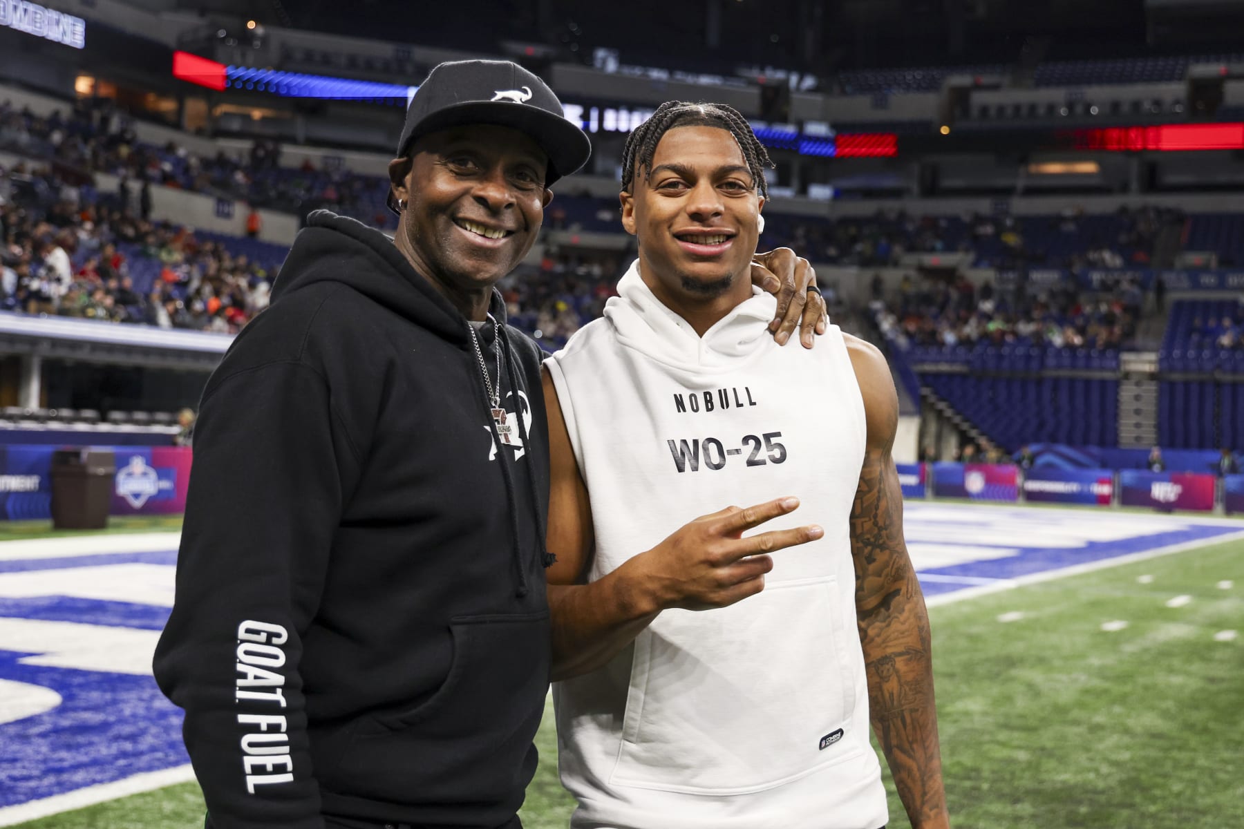 INDIANAPOLIS, INDIANA - MARCH 2: Jerry Rice poses for a picture with his son, Brenden Rice #WO25 of Southern California, during the NFL Scouting Combine at Lucas Oil Stadium on March 2, 2024 in Indianapolis, Indiana. (Photo by Kara Durrette/Getty Images)