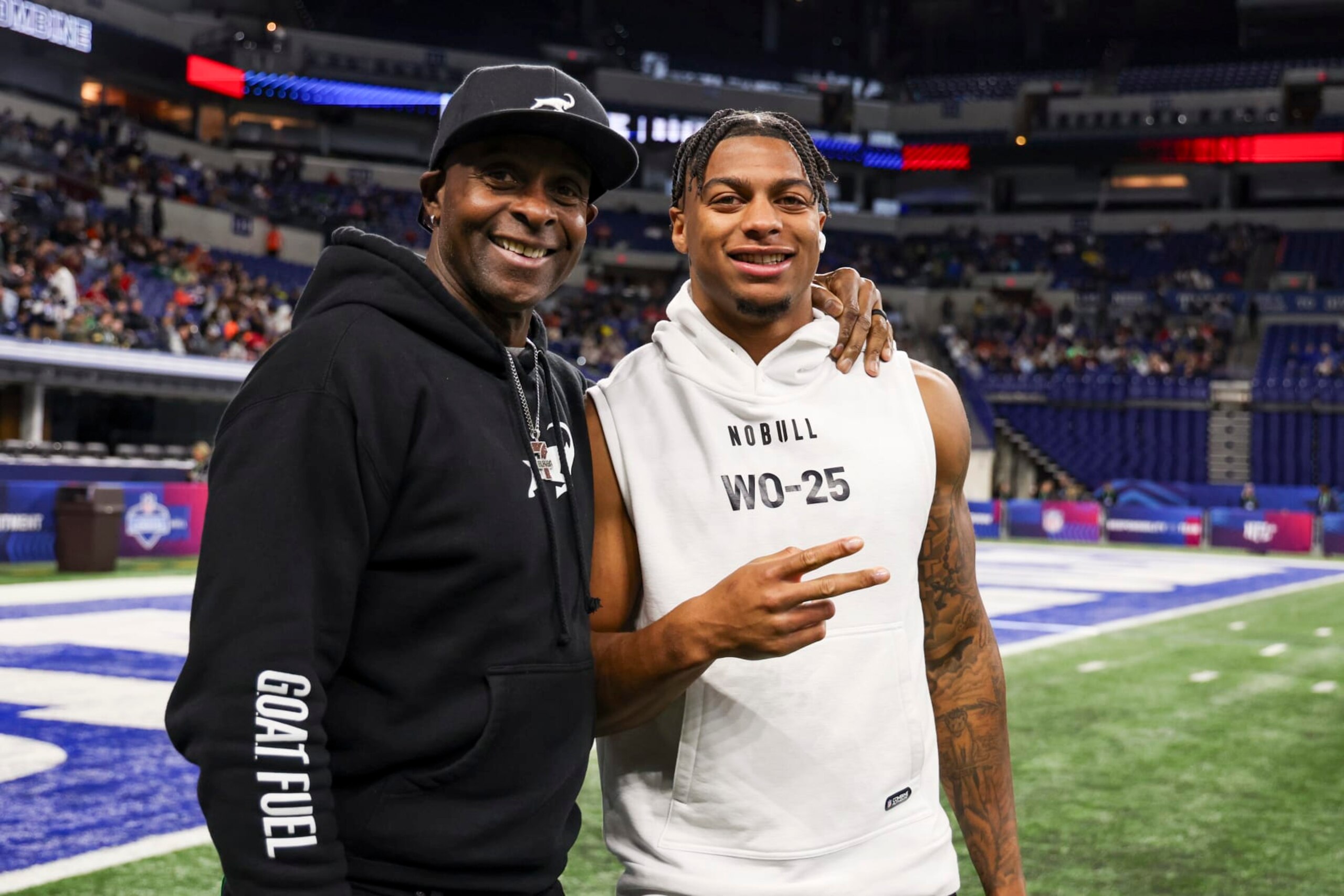 INDIANAPOLIS, INDIANA - MARCH 2: Jerry Rice poses for a picture with his son, Brenden Rice #WO25 of Southern California, during the NFL Scouting Combine at Lucas Oil Stadium on March 2, 2024 in Indianapolis, Indiana. (Photo by Kara Durrette/Getty Images)