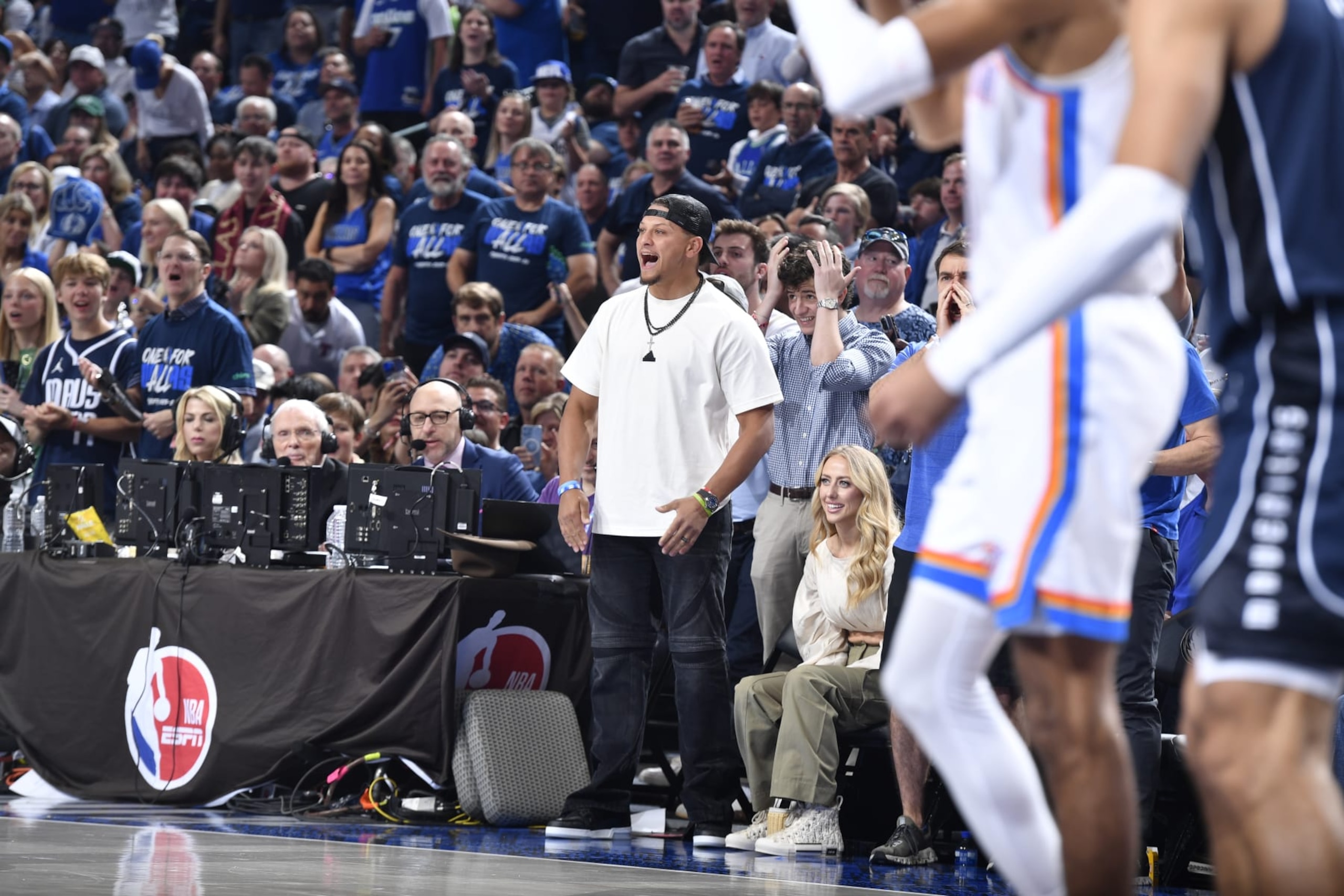 DALLAS, TX - MAY 11: Patrick Mahomes celebrates during the game between the Oklahoma City Thunder and the Dallas Mavericks during Round 2 Game 3 of the 2024 NBA Playoffs on May 11, 2024 at the American Airlines Center in Dallas, Texas. NOTE TO USER: User expressly acknowledges and agrees that, by downloading and or using this photograph, User is consenting to the terms and conditions of the Getty Images License Agreement. Mandatory Copyright Notice: Copyright 2024 NBAE (Photo by Logan Riely/NBAE via Getty Images)