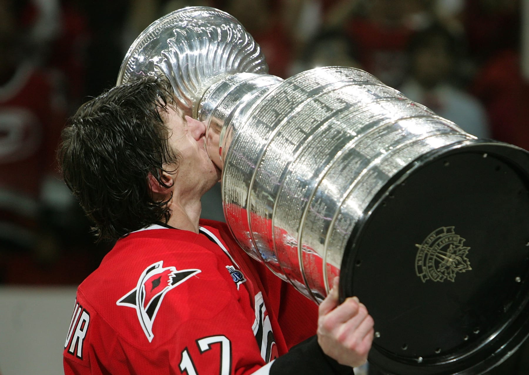 RALEIGH, NC - JUNE 19:  Rod Brind'Amour #17 of the Carolina Hurricanes kisses the Stanley Cup after defeating the Edmonton Oilers in game seven of the 2006 NHL Stanley Cup Finals on June 19, 2006 at the RBC Center in Raleigh, North Carolina. The Hurricanes defeated the Oilers 3-1 to win the Stanley Cup finals 4 games to 3.  (Photo by Jim McIsaac/Getty Images)