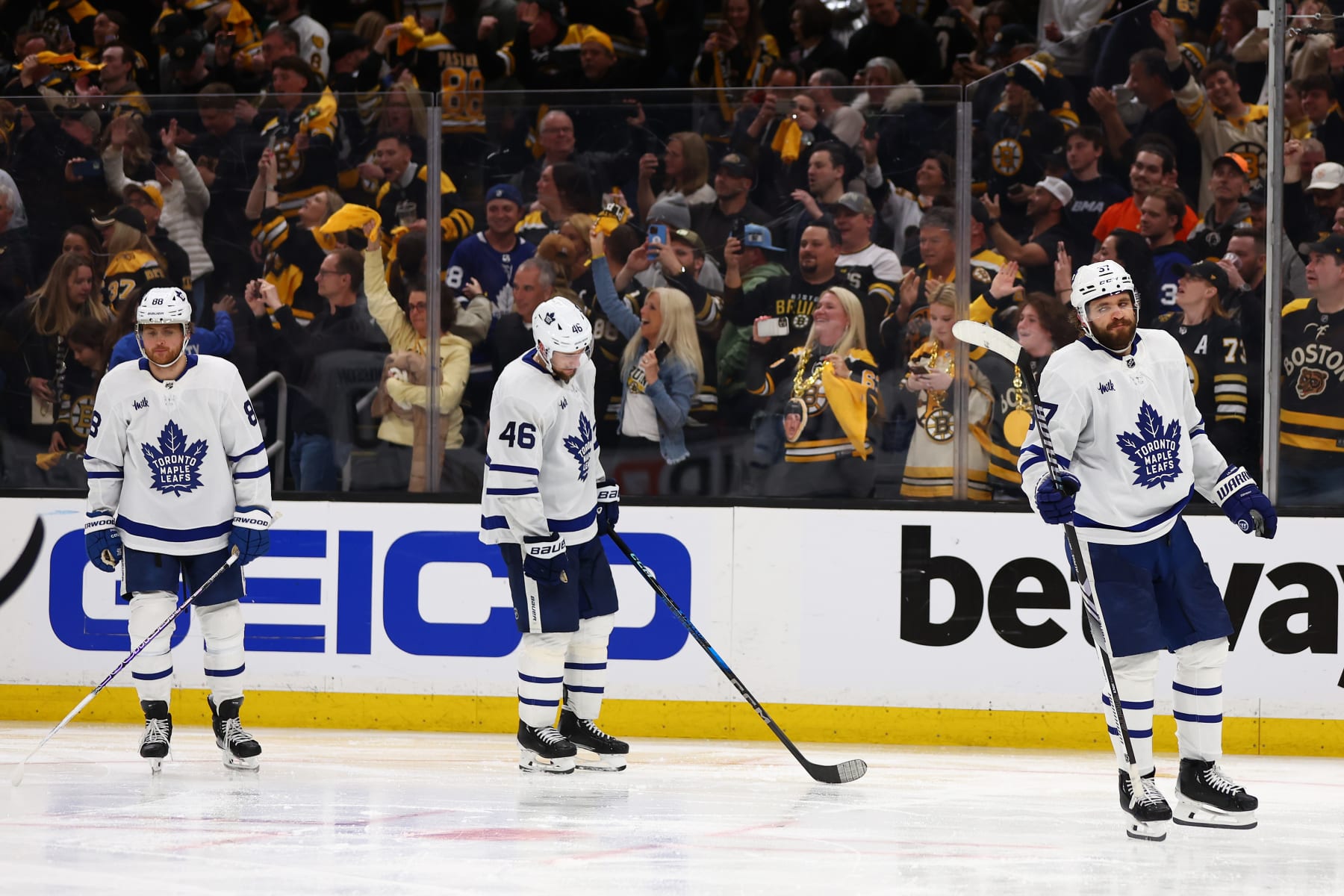 BOSTON, MASSACHUSETTS - MAY 04: William Nylander #88, Ilya Lyubushkin #46 and Timothy Liljegren #37 of the Toronto Maple Leafs react after being defeated by the Boston Bruins in Game Seven of the First Round of the 2024 Stanley Cup Playoffs at TD Garden on May 04, 2024 in Boston, Massachusetts. (Photo by Maddie Meyer/Getty Images)