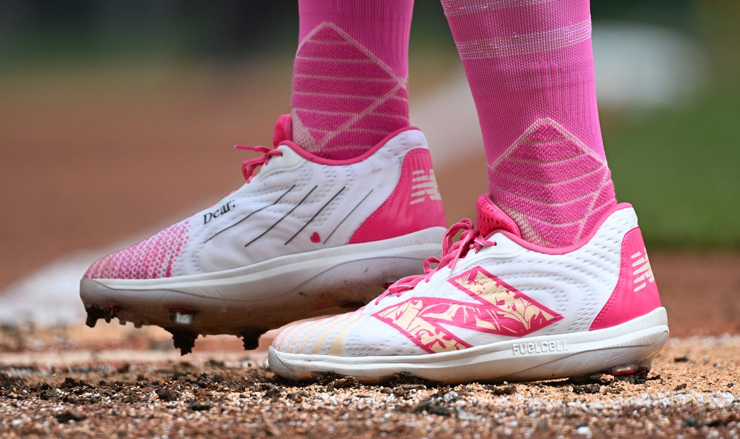 PITTSBURGH, PENNSYLVANIA - MAY 12: A detailed view of the New Balance Mother's Day cleats worn by Bryan Reynolds #10 of the Pittsburgh Pirates during the game against the Chicago Cubs at PNC Park on May 12, 2024 in Pittsburgh, Pennsylvania. (Photo by Justin Berl/Getty Images)