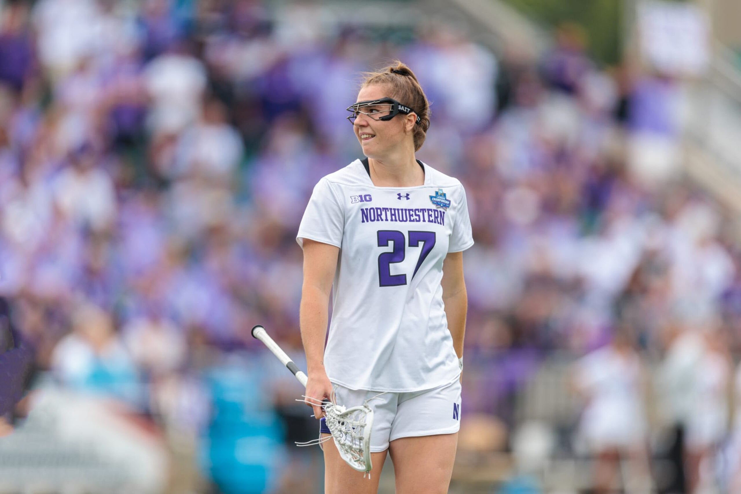 CARY, NORTH CAROLINA - MAY 26: Izzy Scane #27 of the Northwestern Wildcats looks on in the first half during a game against the Denver Pioneers during the Division I Women's Lacrosse Semifinals held at at WakeMed Soccer Park on May 26, 2023 in Cary, North Carolina. (Photo by Ryan Hunt/Getty Images)