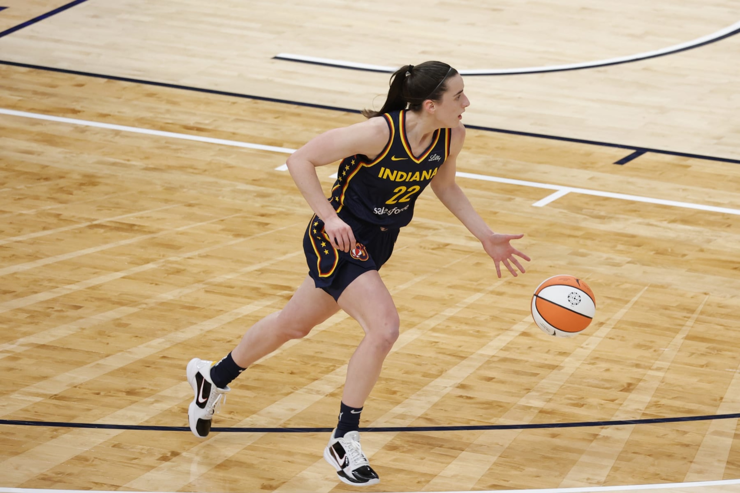 INDIANAPOLIS, IN - MAY 09: Indiana Fever guard Caitlin Clark (22) brings the ball up court against the Atlanta Dream during a WNBA preseason game on May 9, 2024, at Gainbridge Fieldhouse in Indianapolis, Indiana. (Photo by Brian Spurlock/Icon Sportswire via Getty Images) INDIANAPOLIS, IN - MAY 09: Indiana Fever guard Caitlin Clark (22) brings the ball up court against the Atlanta Dream during a WNBA preseason game on May 9, 2024, at Gainbridge Fieldhouse in Indianapolis, Indiana. (Photo by Brian Spurlock/Icon Sportswire via Getty Images)