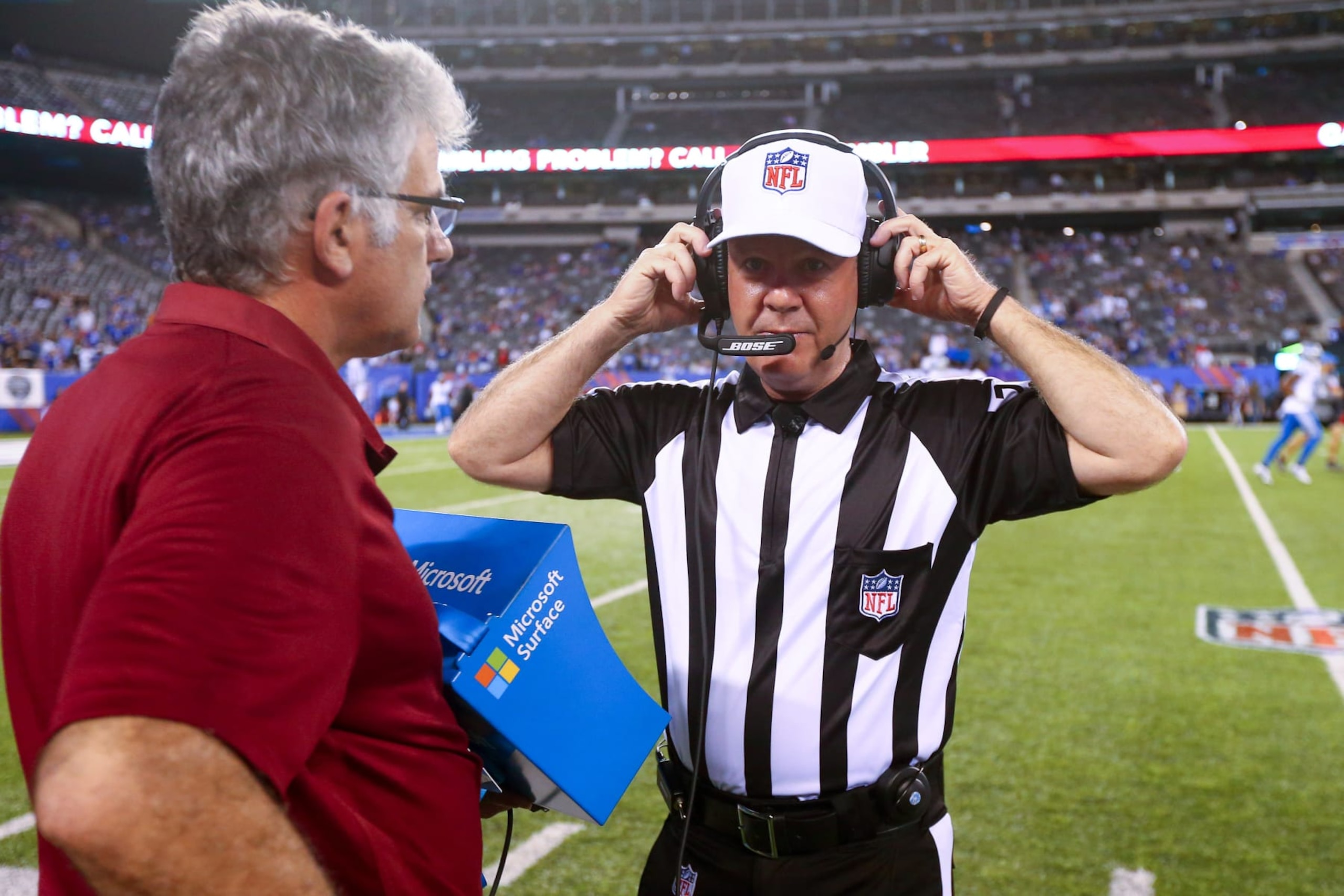 EAST RUTHERFORD, NJ - SEPTEMBER 18:  National Football League Referee John Parry checks out the Microsoft Surface prior to the National Football League game between the New York Giants and the Detroit Lions on September 18, 2017, at MetLife Stadium in East Rutherford, NJ. (Photo by Rich Graessle/Icon Sportswire via Getty Images)