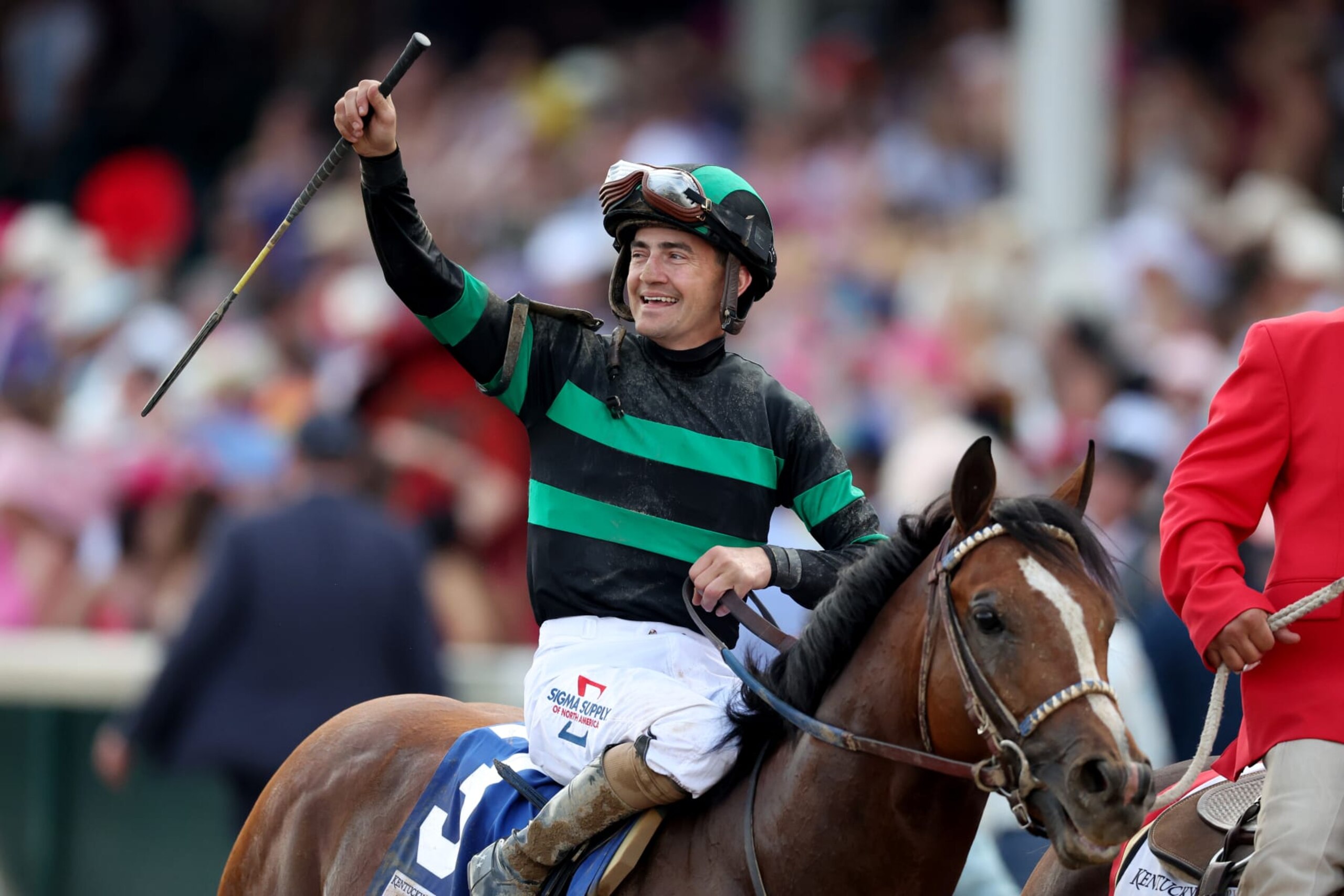 LOUISVILLE, KENTUCKY - MAY 04: Jockey Brian J. Hernandez Jr. on top of Mystik Dan celebrates after winning the 150th running of the Kentucky Derby at Churchill Downs on May 04, 2024 in Louisville, Kentucky. (Photo by Rob Carr/Getty Images)