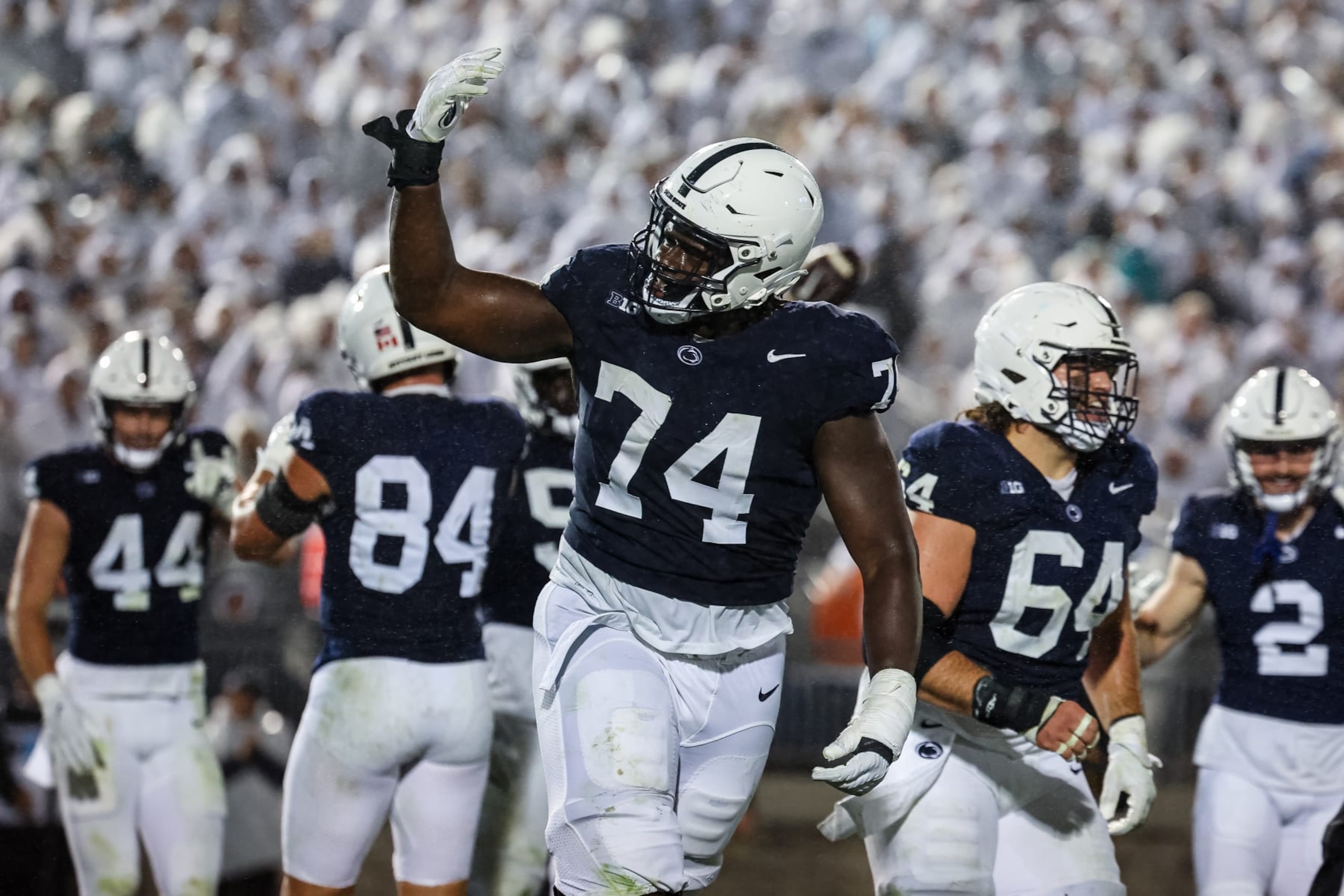 STATE COLLEGE, PA - SEPTEMBER 23: Olumuyiwa Fashanu #74 of the Penn State Nittany Lions celebrates after an offensive touchdown during the second half against the Iowa Hawkeyes at Beaver Stadium on September 23, 2023 in State College, Pennsylvania. (Photo by Scott Taetsch/Getty Images)