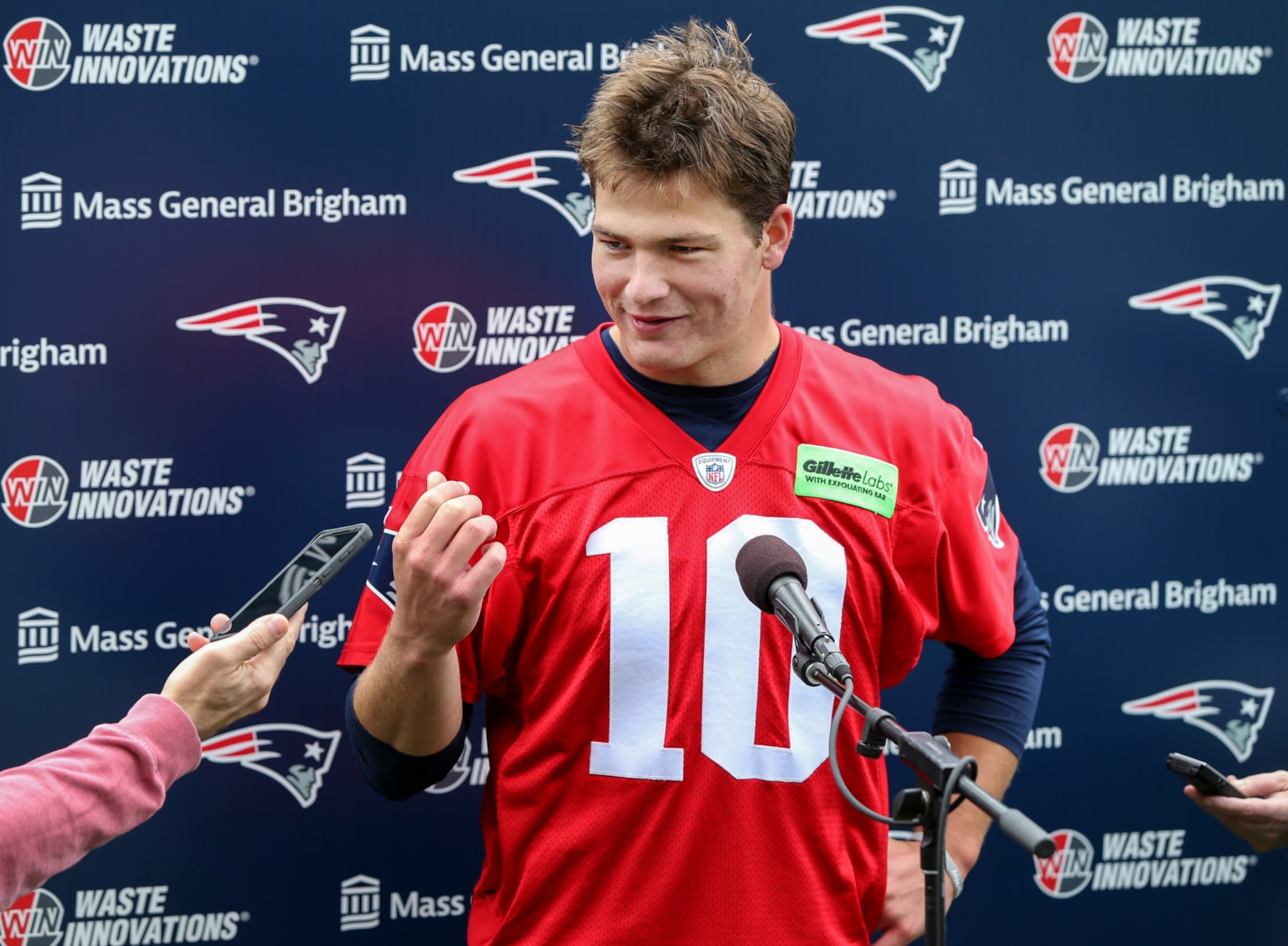 Foxborough, MA - May 11: New England Patriots QB Drake Maye talks with the media  at the team's 2024 Rookie Mini-Camp. (Photo by Jonathan Wiggs/The Boston Globe via Getty Images)