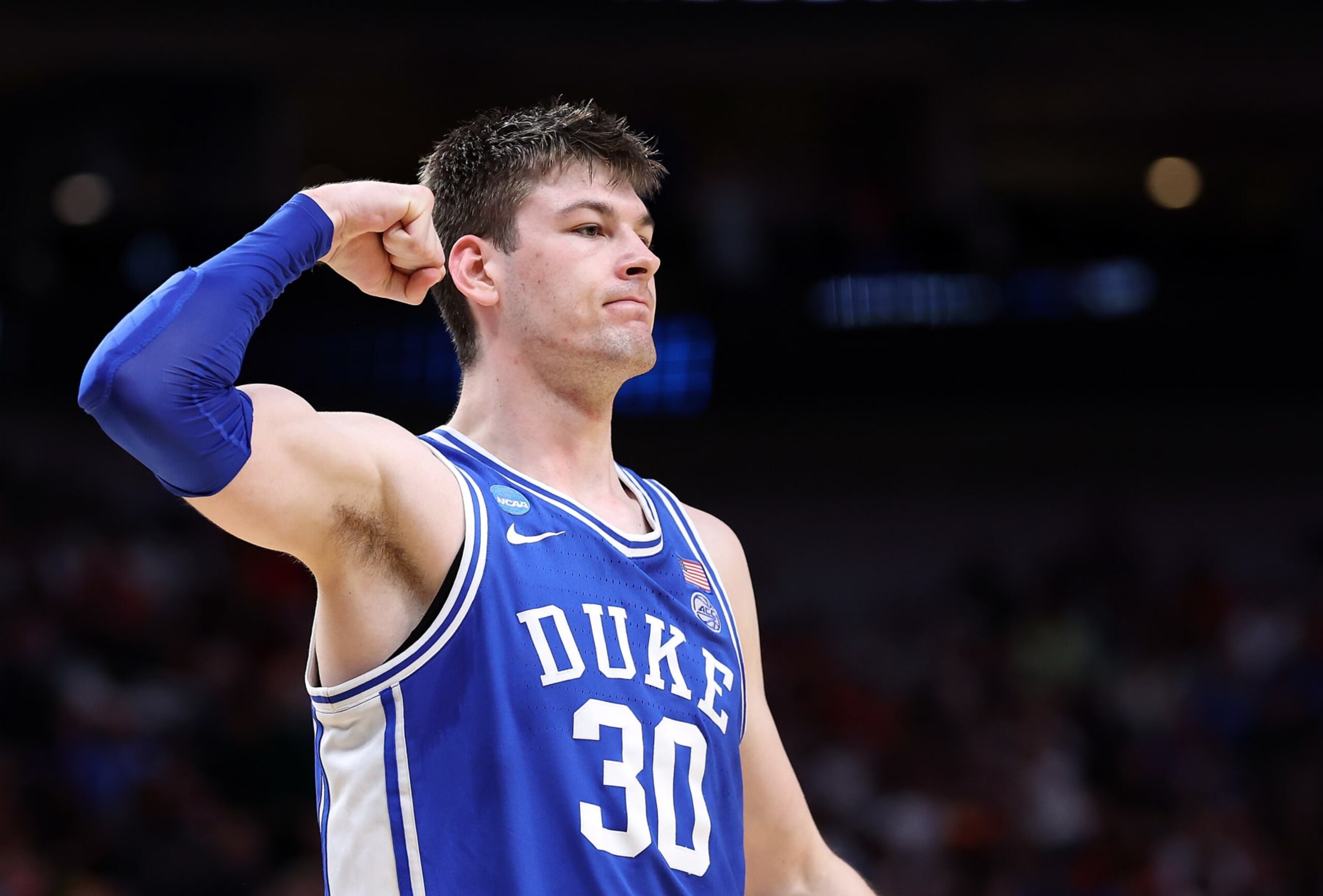 DALLAS, TEXAS - MARCH 29:  Kyle Filipowski #30 of the Duke Blue Devils reacts after scoring during the second half of the Sweet 16 round of the NCAA Men's Basketball Tournament against the Houston Cougars at American Airlines Center on March 29, 2024 in Dallas, Texas. (Photo by Patrick Smith/Getty Images)