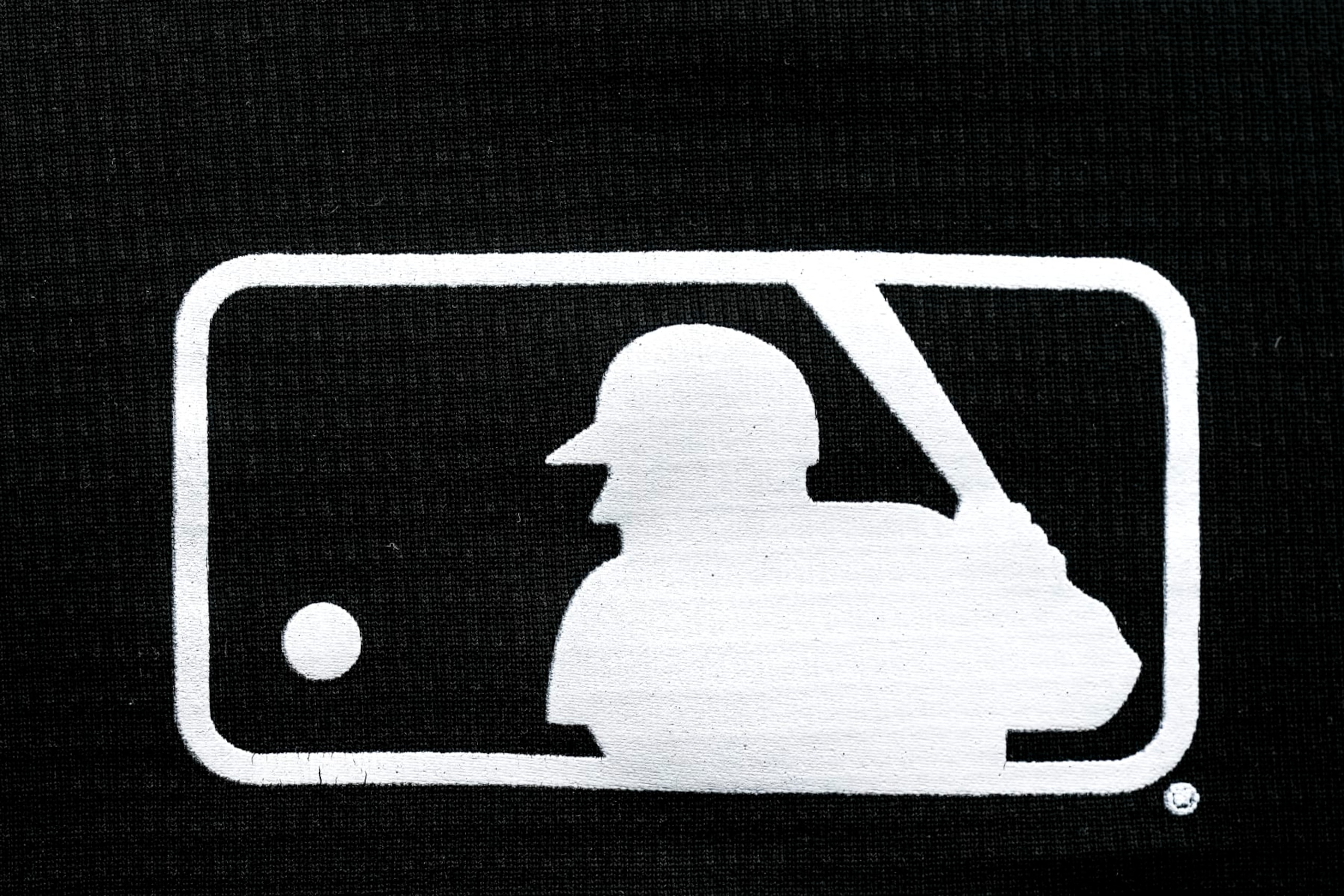 DETROIT, MICHIGAN - APRIL 28: A detail of the MLB Major League Baseball logo on an article of clothing during the game between the Detroit Tigers and Kansas City Royals at Comerica Park on April 28, 2024 in Detroit, Michigan. (Photo by Nic Antaya/Getty Images)