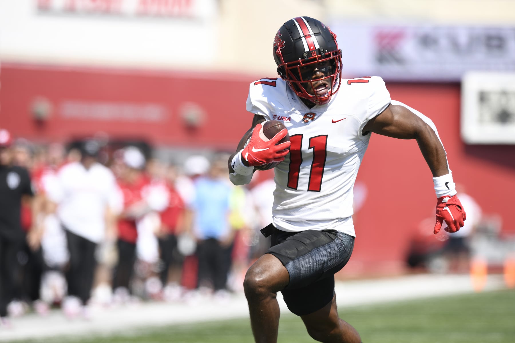 BLOOMINGTON, IN - SEPTEMBER 17: Western Kentucky Hilltoppers wide receiver Malachi Corley (11) advances the ball during the college football game between the Western Kentucky Hilltoppers and the Indiana Hoosiers on September 17, 2022, at Memorial Stadium in Bloomington, Indiana. (Photo by Michael Allio/Icon Sportswire via Getty Images)