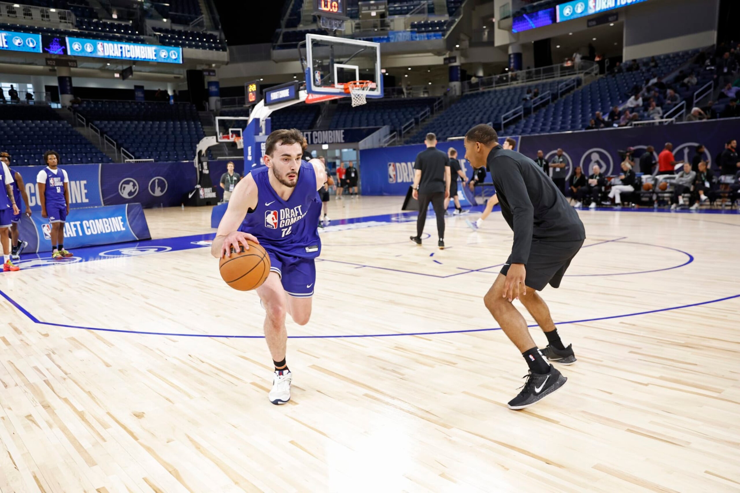 CHICAGO, IL - MAY 13: Alex Karaban dribbles the ball during the 2024 NBA Combine on May 13, 2024 at Wintrust Arena in Chicago, Illinois. NOTE TO USER: User expressly acknowledges and agrees that, by downloading and or using this photograph, User is consenting to the terms and conditions of the Getty Images License Agreement. Mandatory Copyright Notice: Copyright 2024 NBAE (Photo by Kamil Krzaczynski/NBAE via Getty Images)