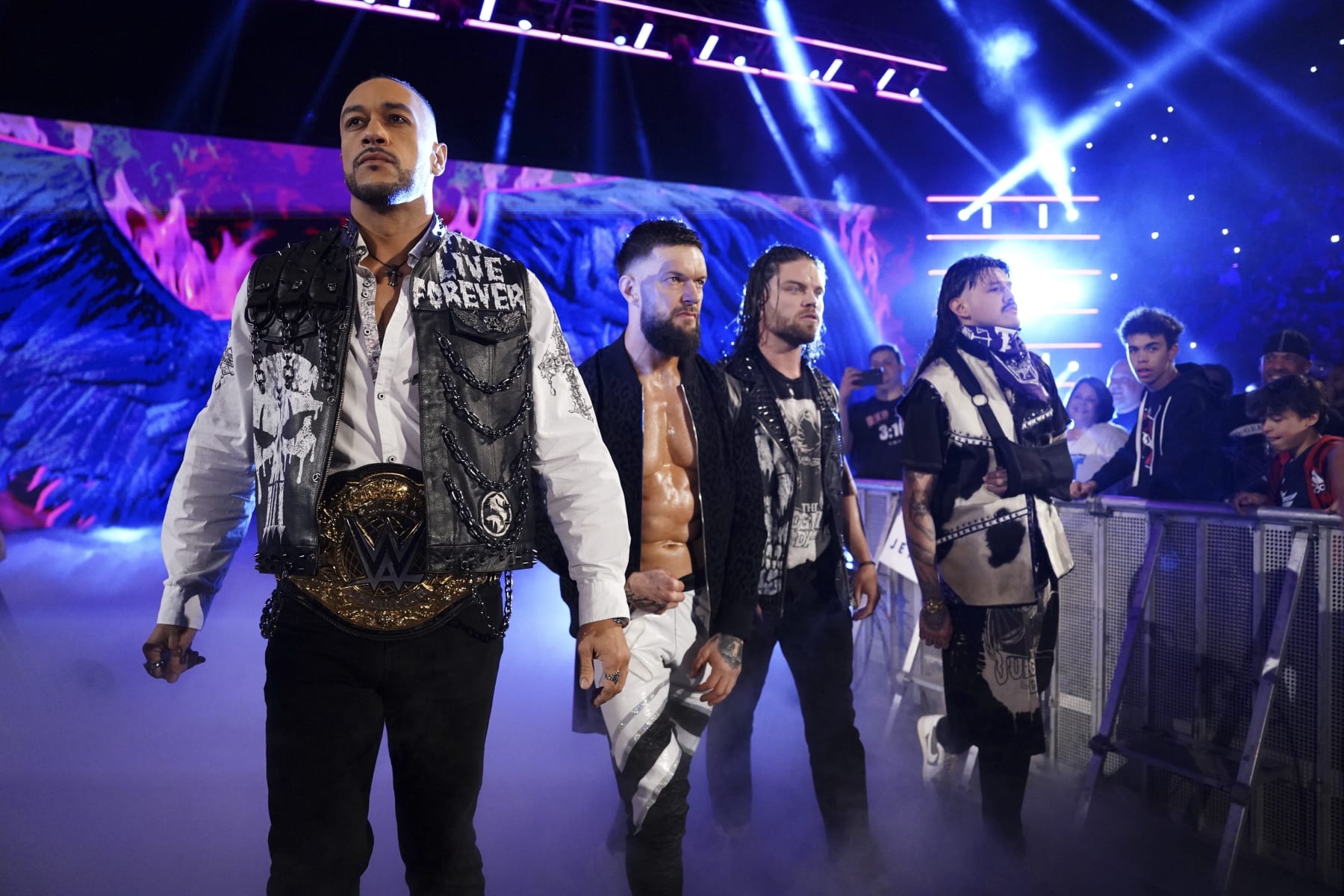 HARTFORD, CONNECTICUT - MAY 6: Damian Priest, Finn Balor, JD McDonagh, and Dominik Mysterio of The Judgment Day enter the arena during Monday Night RAW at XL Center on May 6, 2024 in Hartford, Connecticut.  (Photo by WWE/Getty Images)